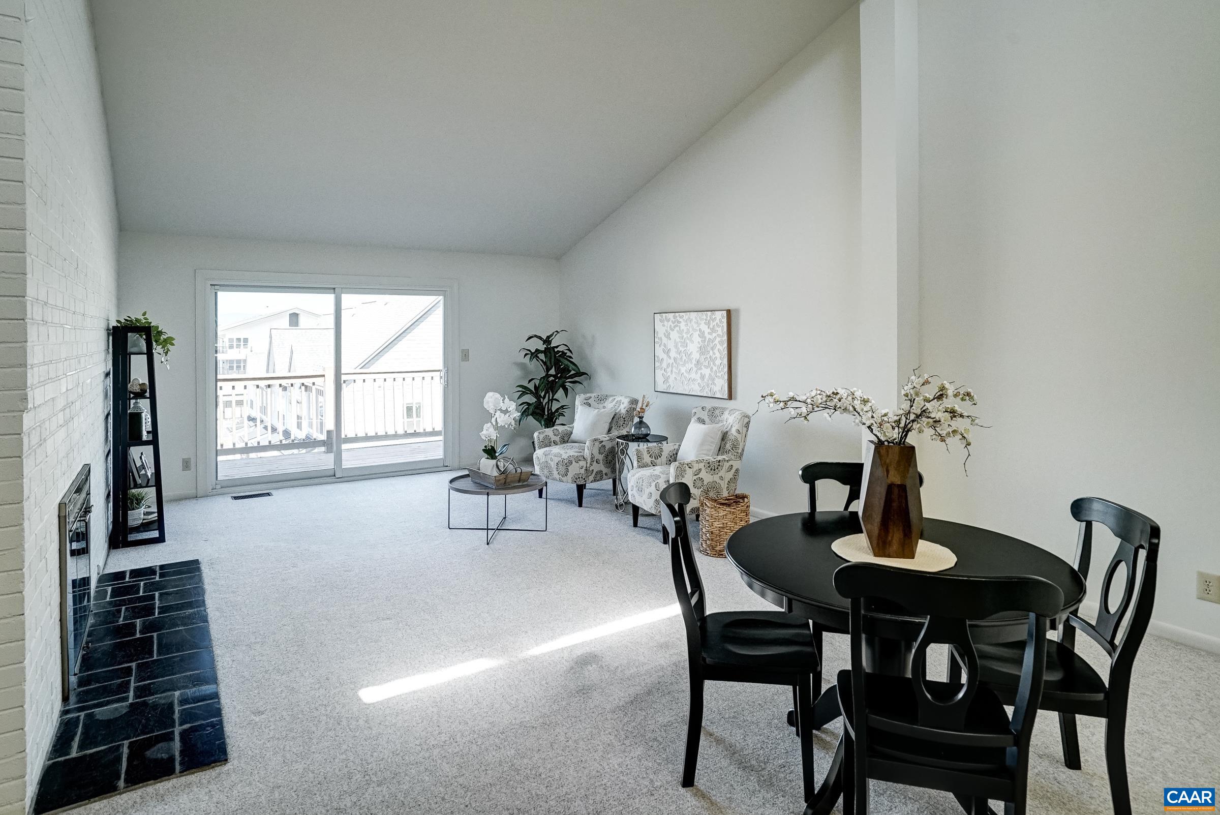 Great room with dining area and seating space