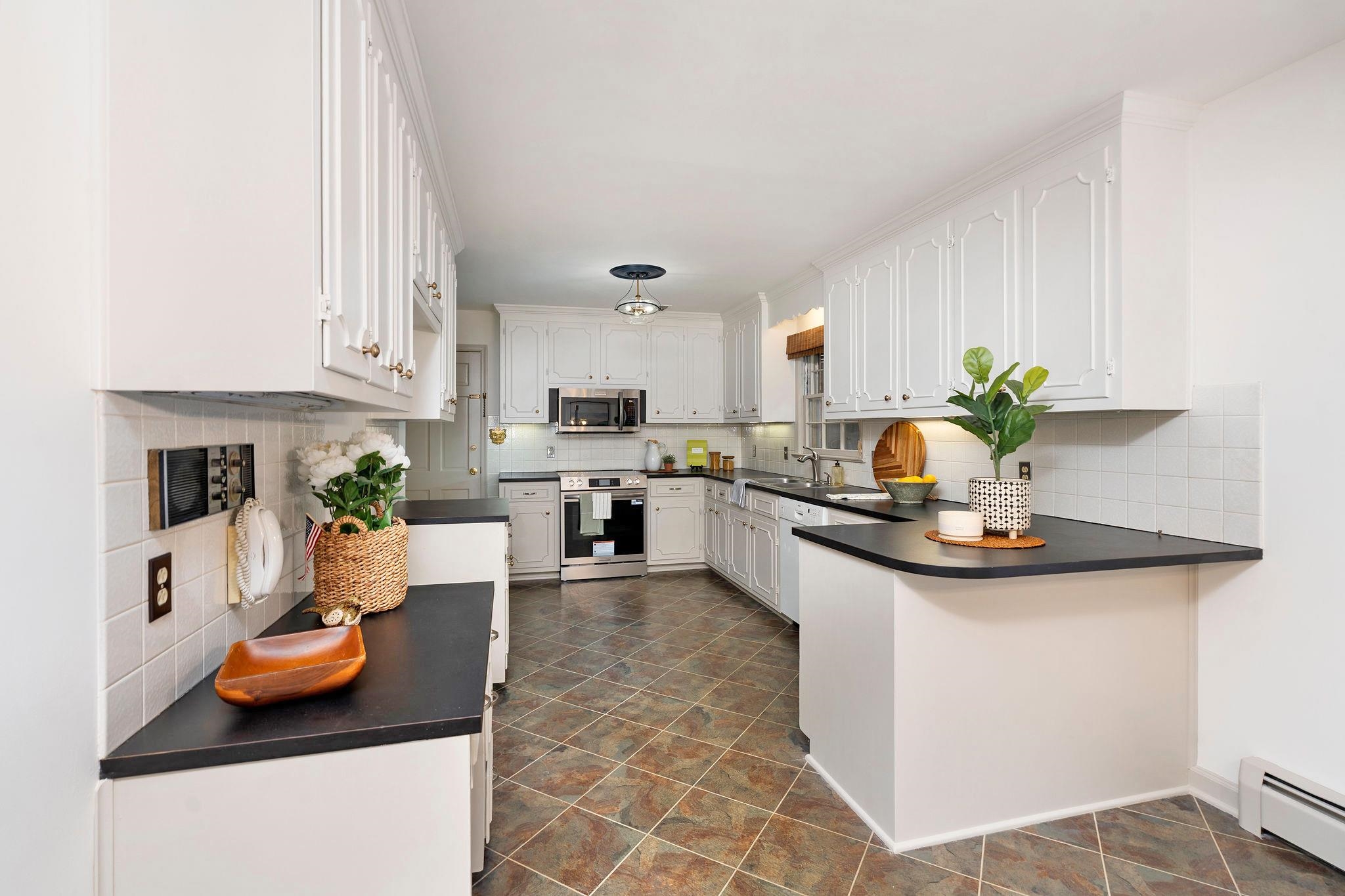 ...plenty of pantry space (not shown) & garage access.