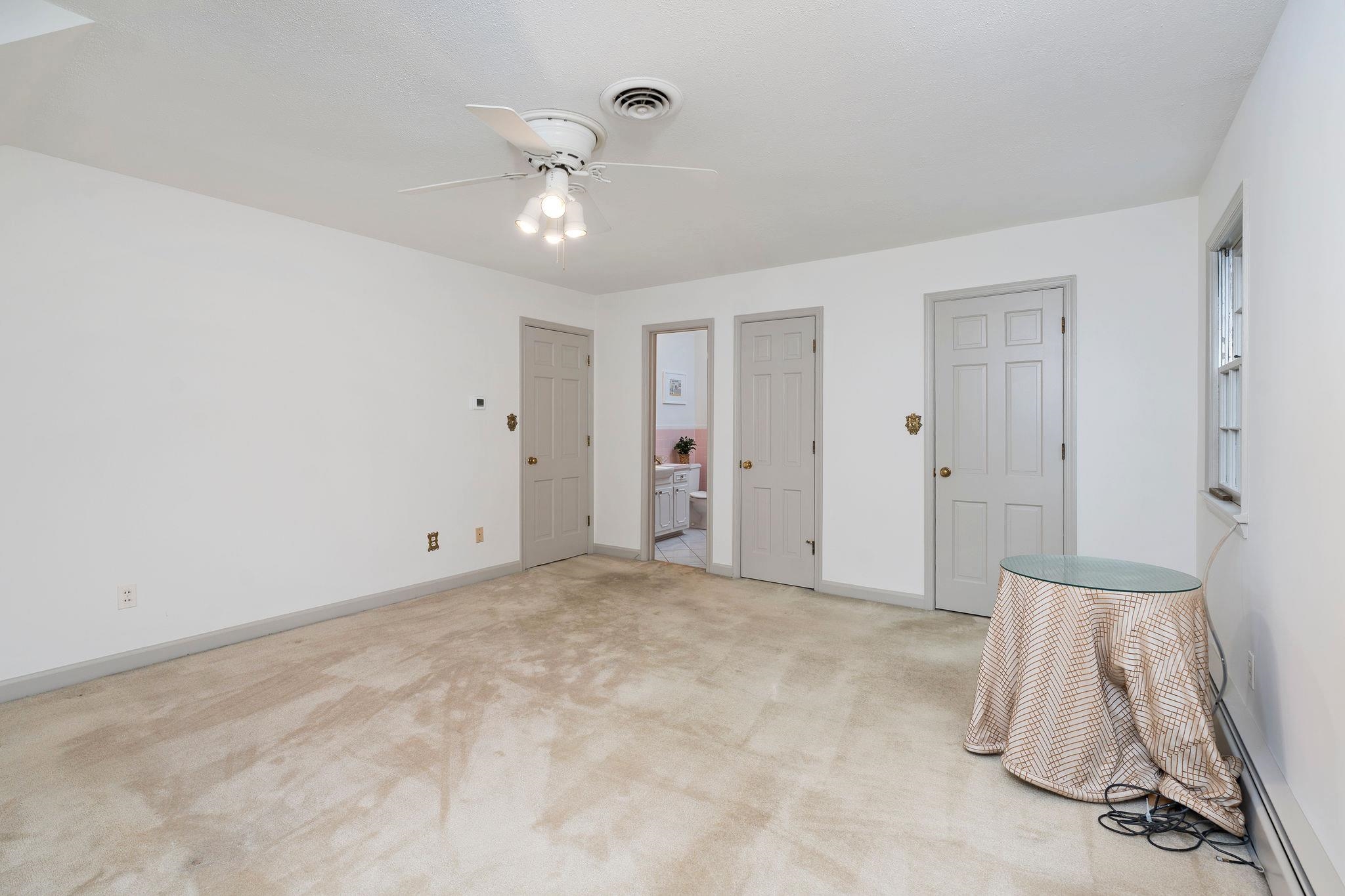 ...view to full bathroom, purse closet, and walk-in-closet.