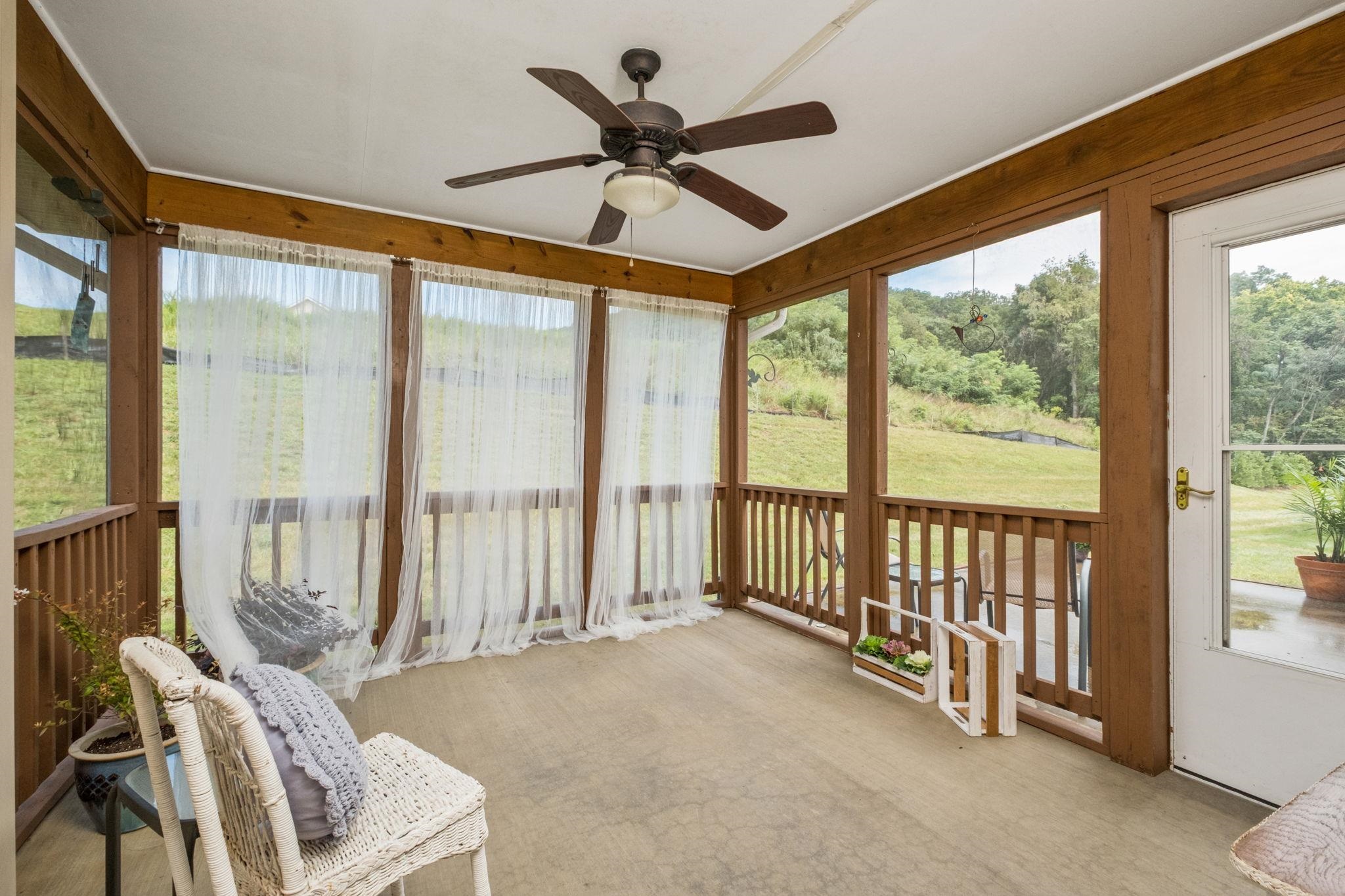 Walk out to the screened porch from the great room/kitchen area
