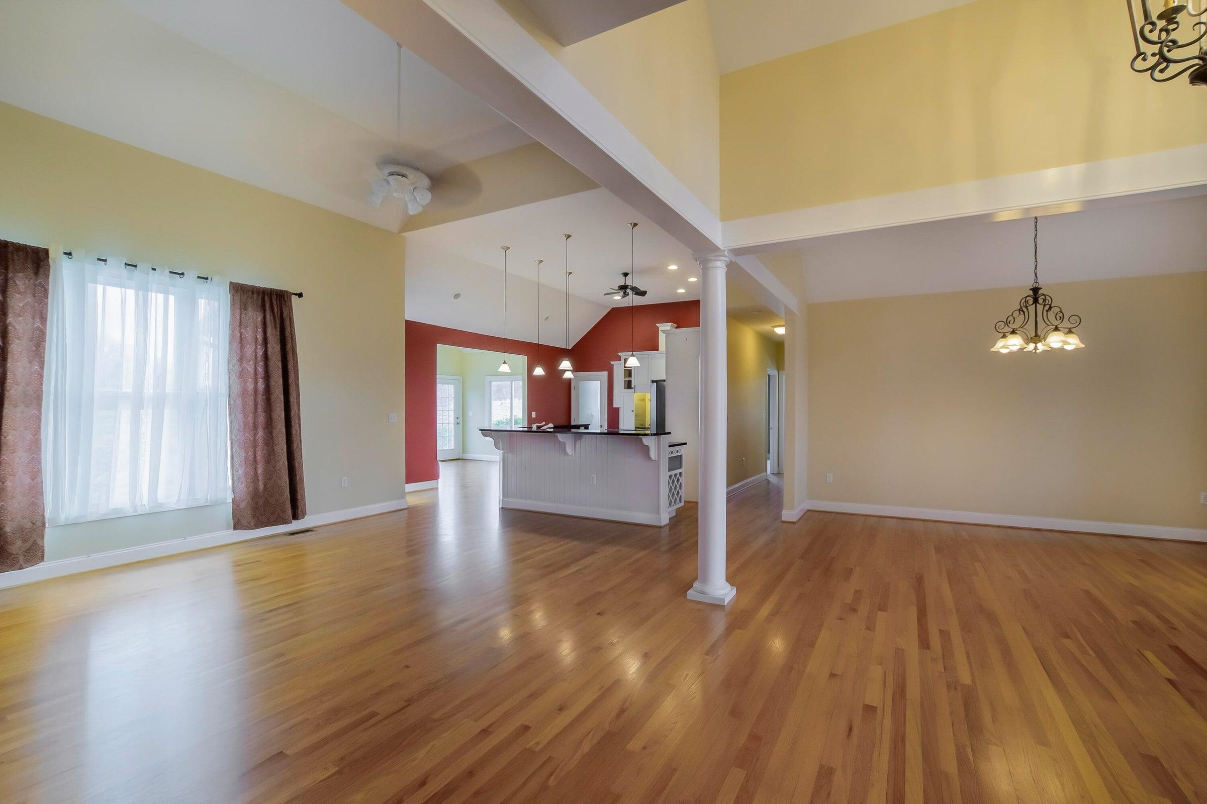 Open floor plan with kitchen, dining room, living room and sun room!