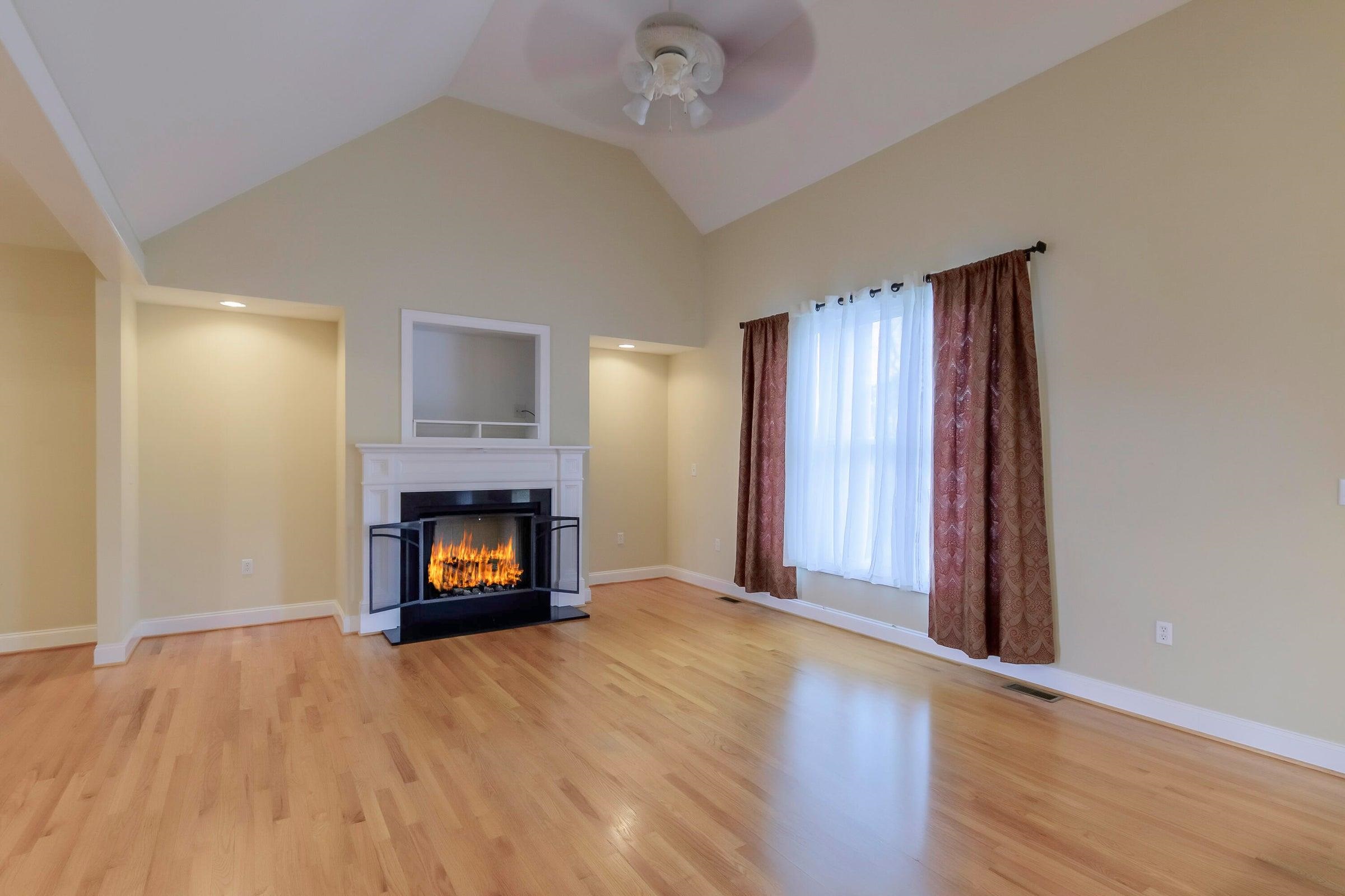 Living room with gas fireplace.