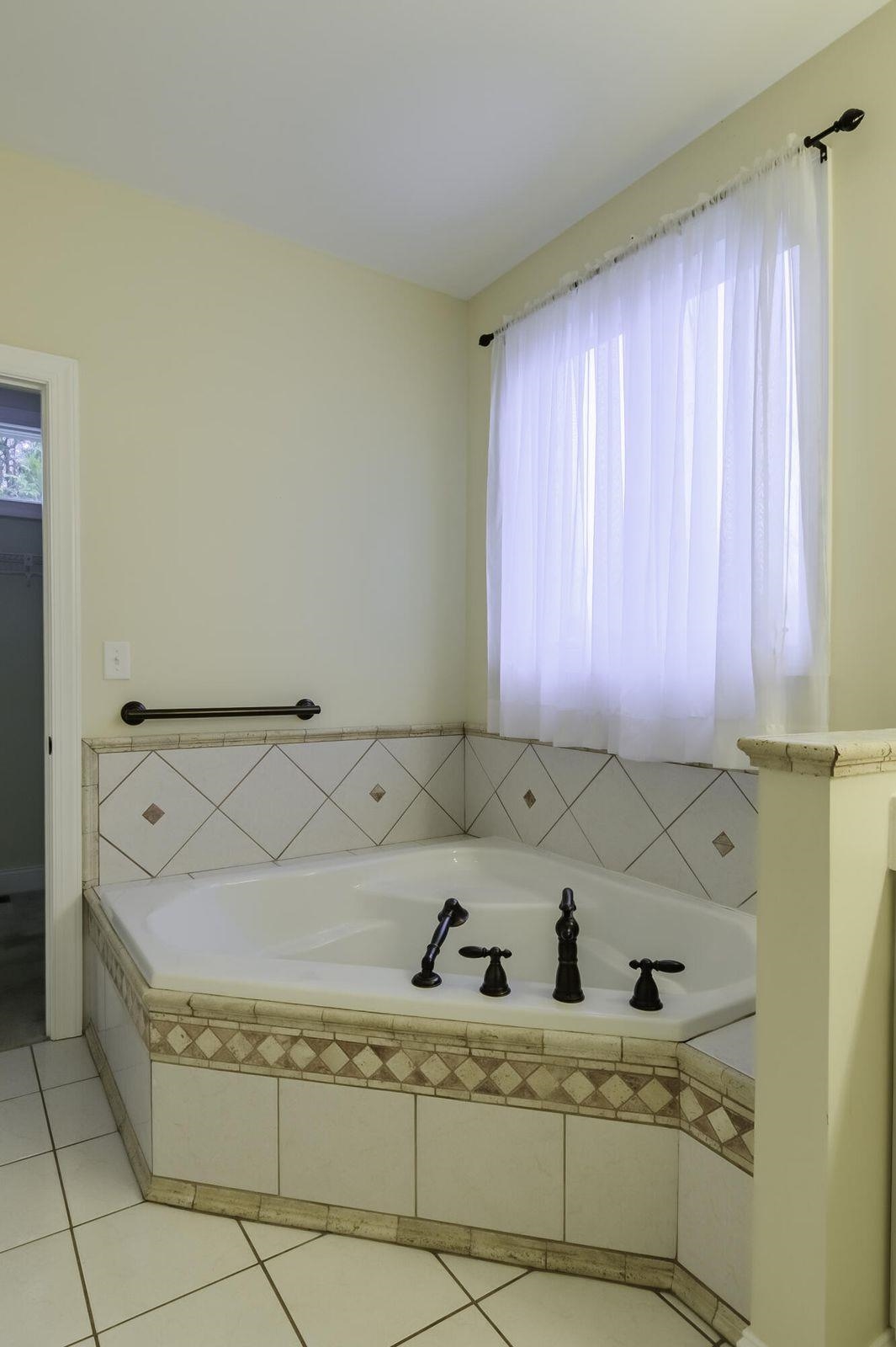 Primary Bath, Jetted Tub, walk-in closet.