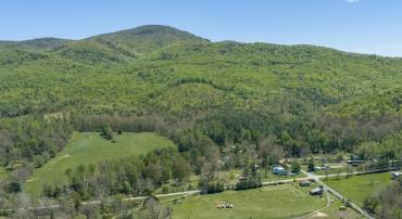 Set between Mill Mountain and Brattons Run, this 35± acre property captures sweeping valley views and expansive mountain vistas.