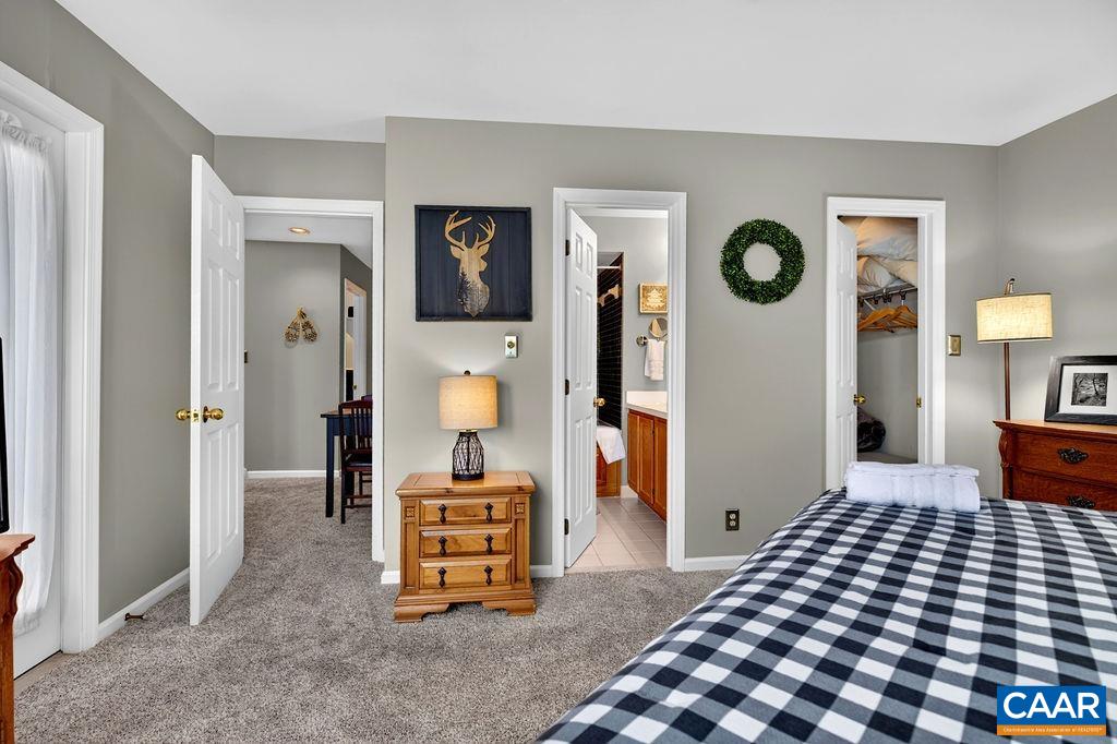 Both primary suites feature a walk-in closet and an attached primary bath.