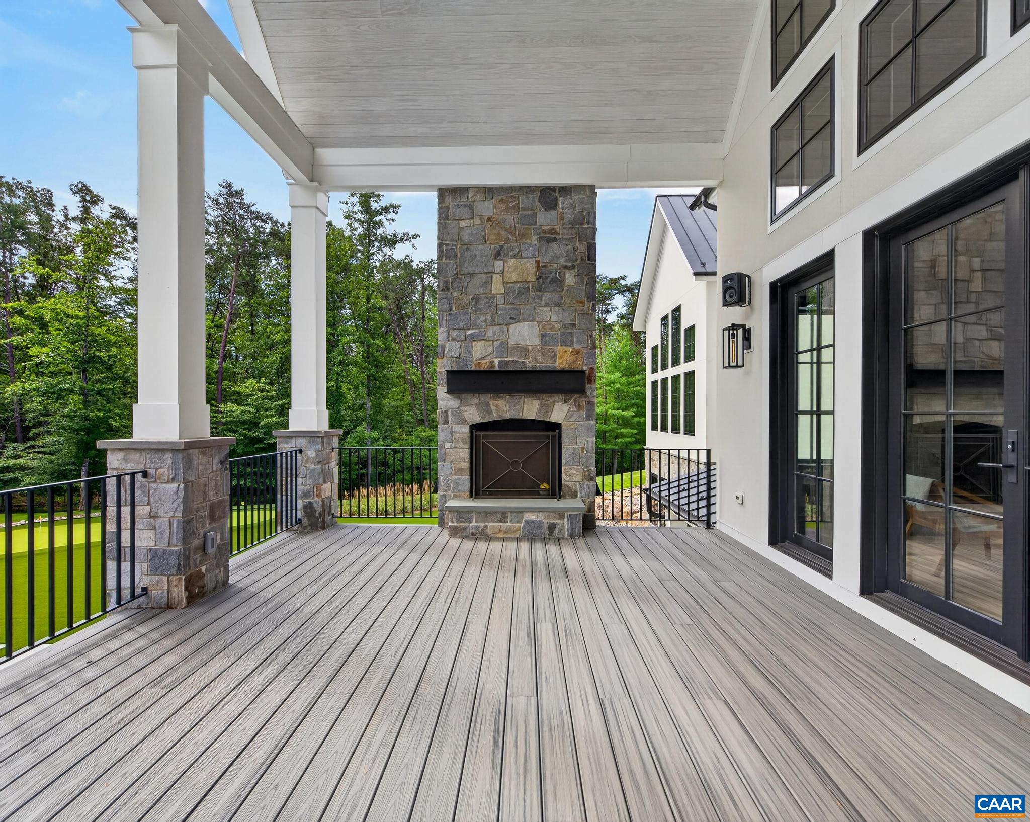 Covered deck off great room that overlooks pool Covered deck off great room that overlooks pool