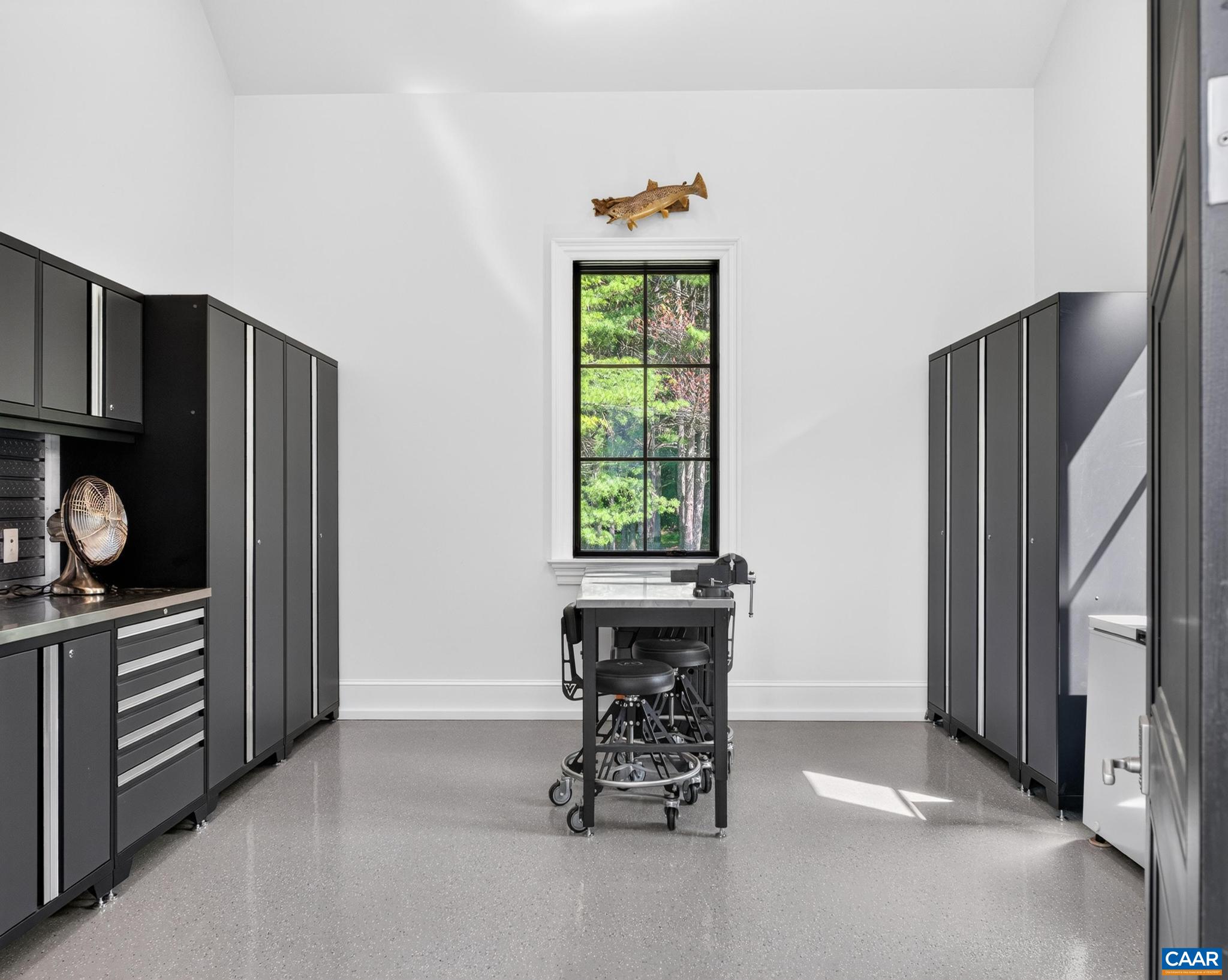 2nd mudroom or outdoor activity storage between garage and mudroom. Epoxy floor. Cabinetry available for purchase. 2nd mudroom or outdoor activity storage between garage and mudroom. Epoxy floor. Cabinetry available for purchase.