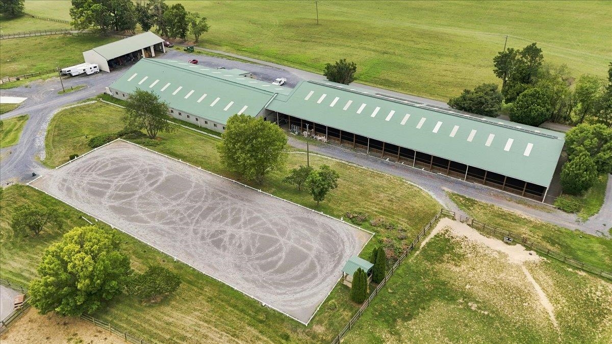 Premier Equestrian Facility on 38.76 Acres | 40-Stall Barn | 14,400 SF Indoor Arena | Dressage Ring | Jumping Ring | Cross-Country Course | Equipment Shed | Multiple Fields & Run-In Sheds | Trail-Riding Access Premier Equestrian Facility on 38.76 Acres | 40-Stall Barn | 14,400 SF Indoor Arena | Dressage Ring | Jumping Ring | Cross-Country Course | Equipment Shed | Multiple Fields & Run-In Sheds | Trail-Riding Access