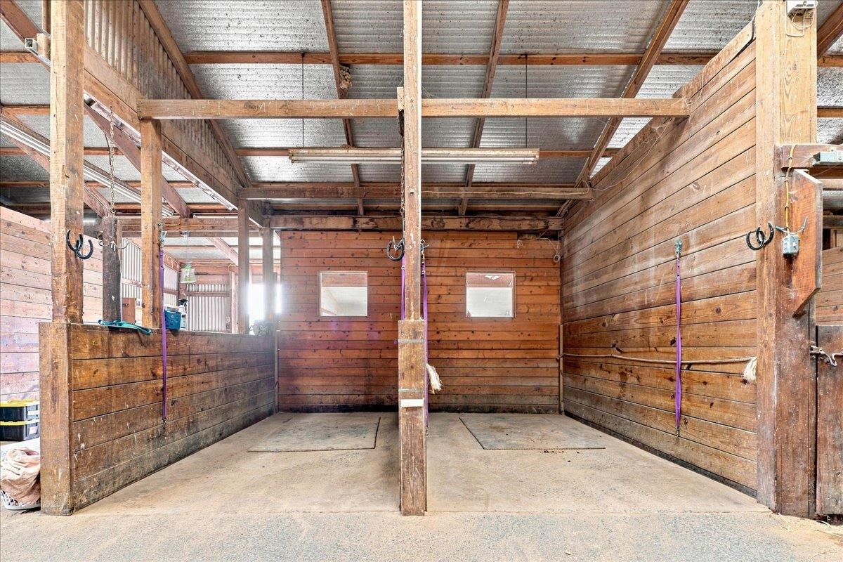 40-stall stable with wood post-and-beam construction, metal roof, rubber-matted stalls, office, laundry, bathroom, wash racks, tack rooms and loft storage. Includes a 3-bedroom apartment with kitchen, bath and living area. 40-stall stable with wood post-and-beam construction, metal roof, rubber-matted stalls, office, laundry, bathroom, wash racks, tack rooms and loft storage. Includes a 3-bedroom apartment with kitchen, bath and living area.