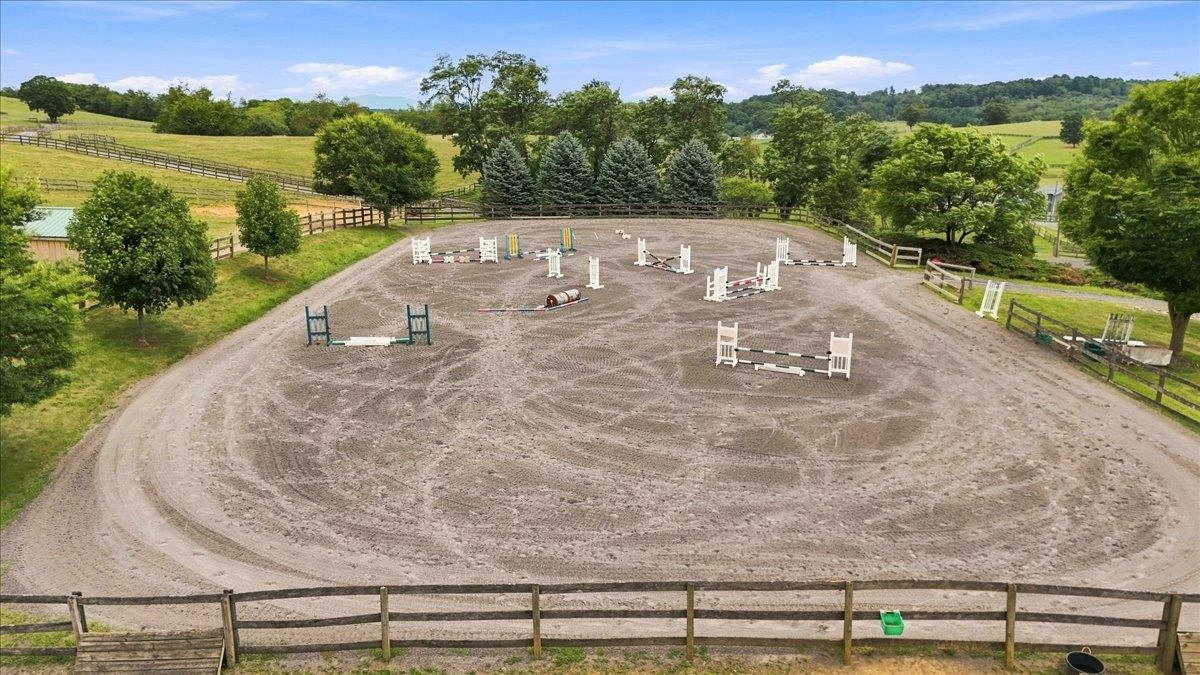 100'X200' Rock dust base footing and wood fence 100'X200' Rock dust base footing and wood fence