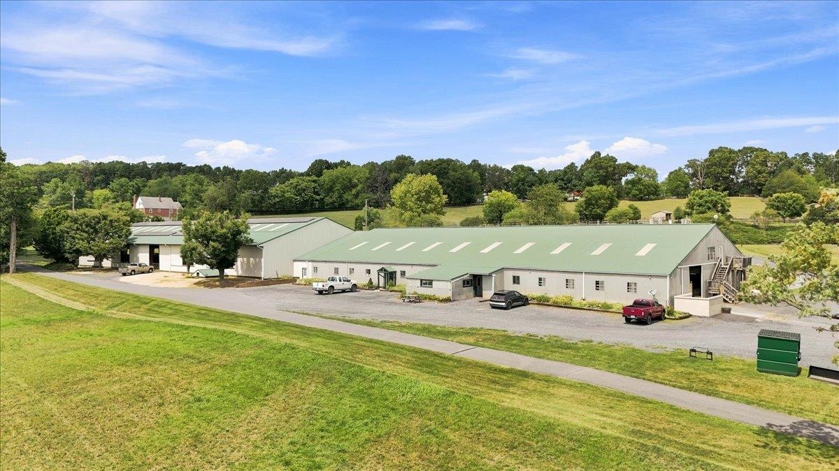 Premier Equestrian Facility on 38.76 Acres | 40-Stall Barn | 14,400 SF Indoor Arena | Dressage Ring | Jumping Ring | Cross-Country Course | Equipment Shed | Multiple Fields & Run-In Sheds | Trail-Riding Access Premier Equestrian Facility on 38.76 Acres | 40-Stall Barn | 14,400 SF Indoor Arena | Dressage Ring | Jumping Ring | Cross-Country Course | Equipment Shed | Multiple Fields & Run-In Sheds | Trail-Riding Access