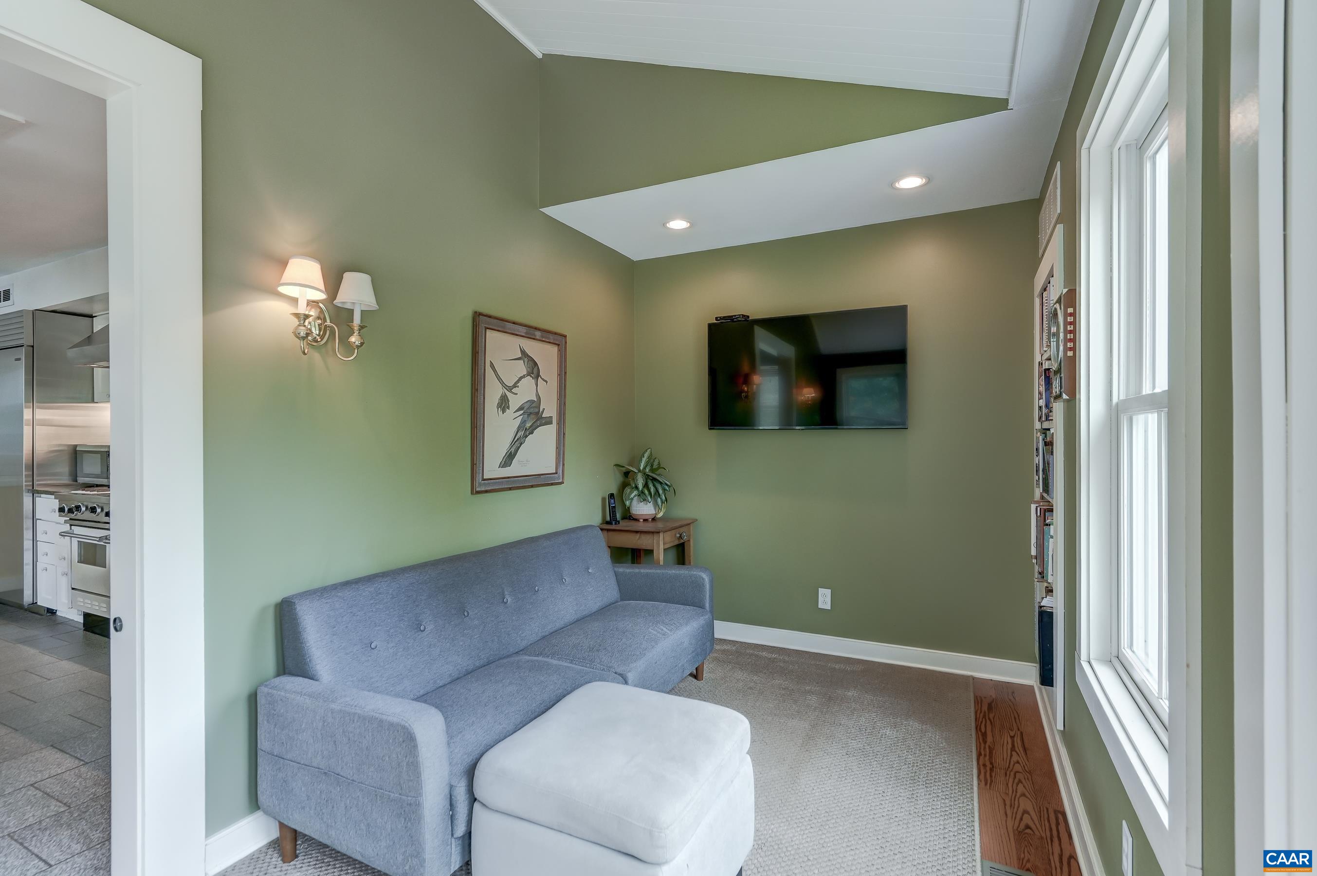 Cozy sitting room adjoins the kitchen
