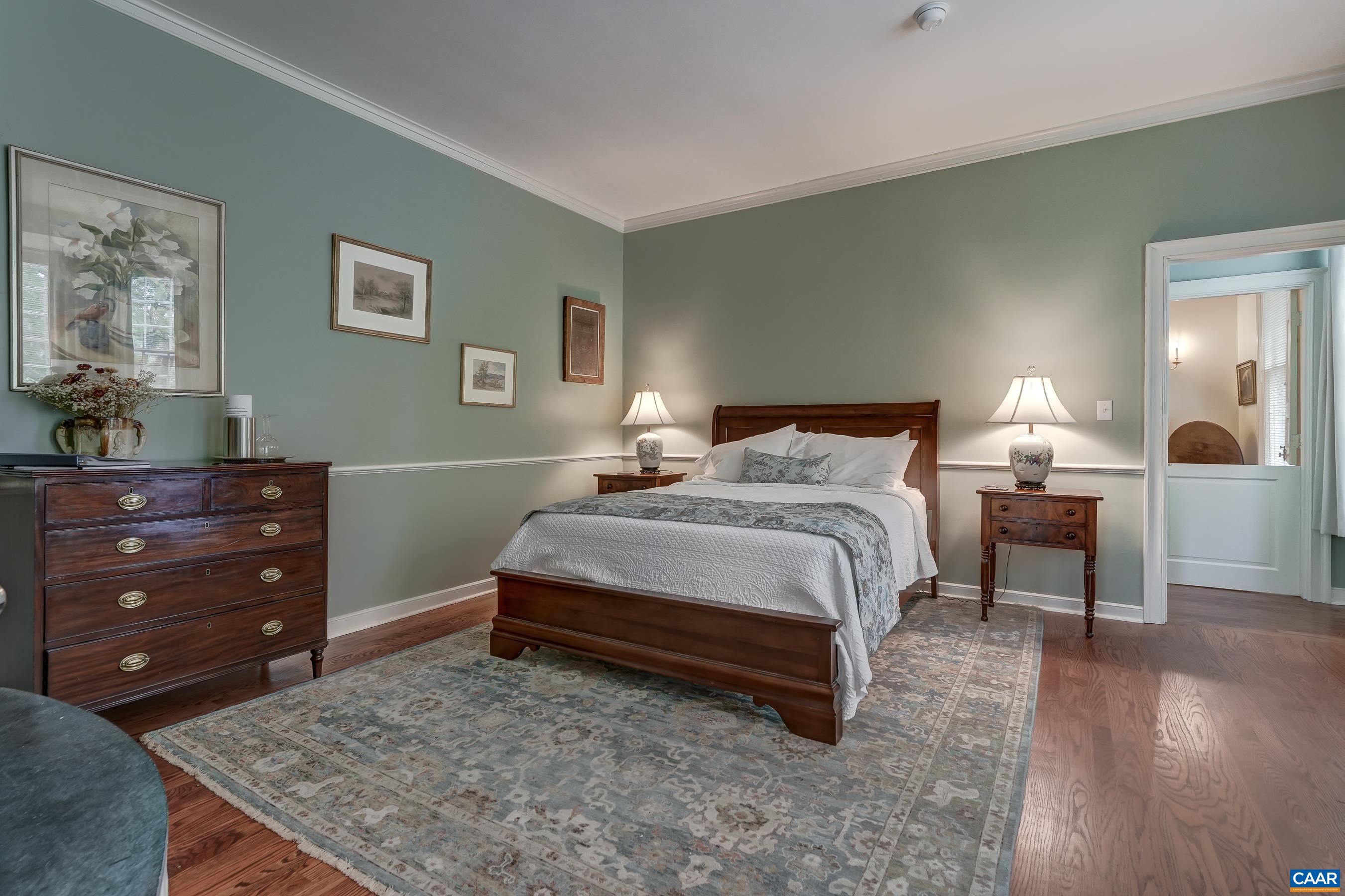 Main level primary suite with fas fireplace