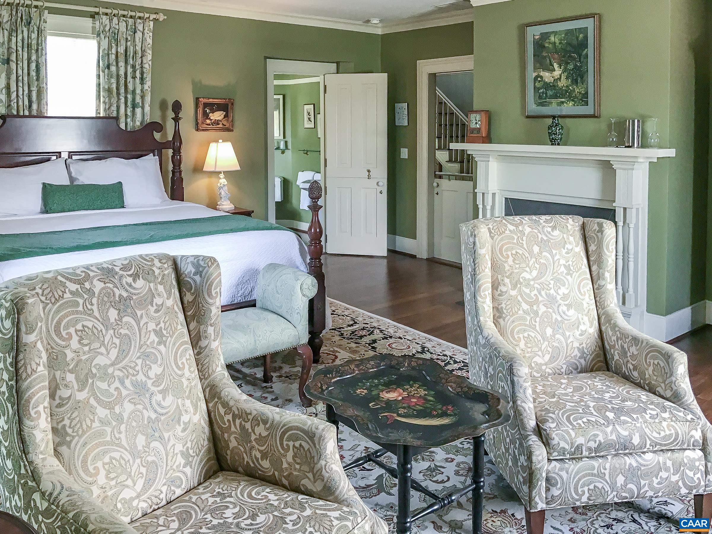 Second floor guest suite 3 with balcony access.