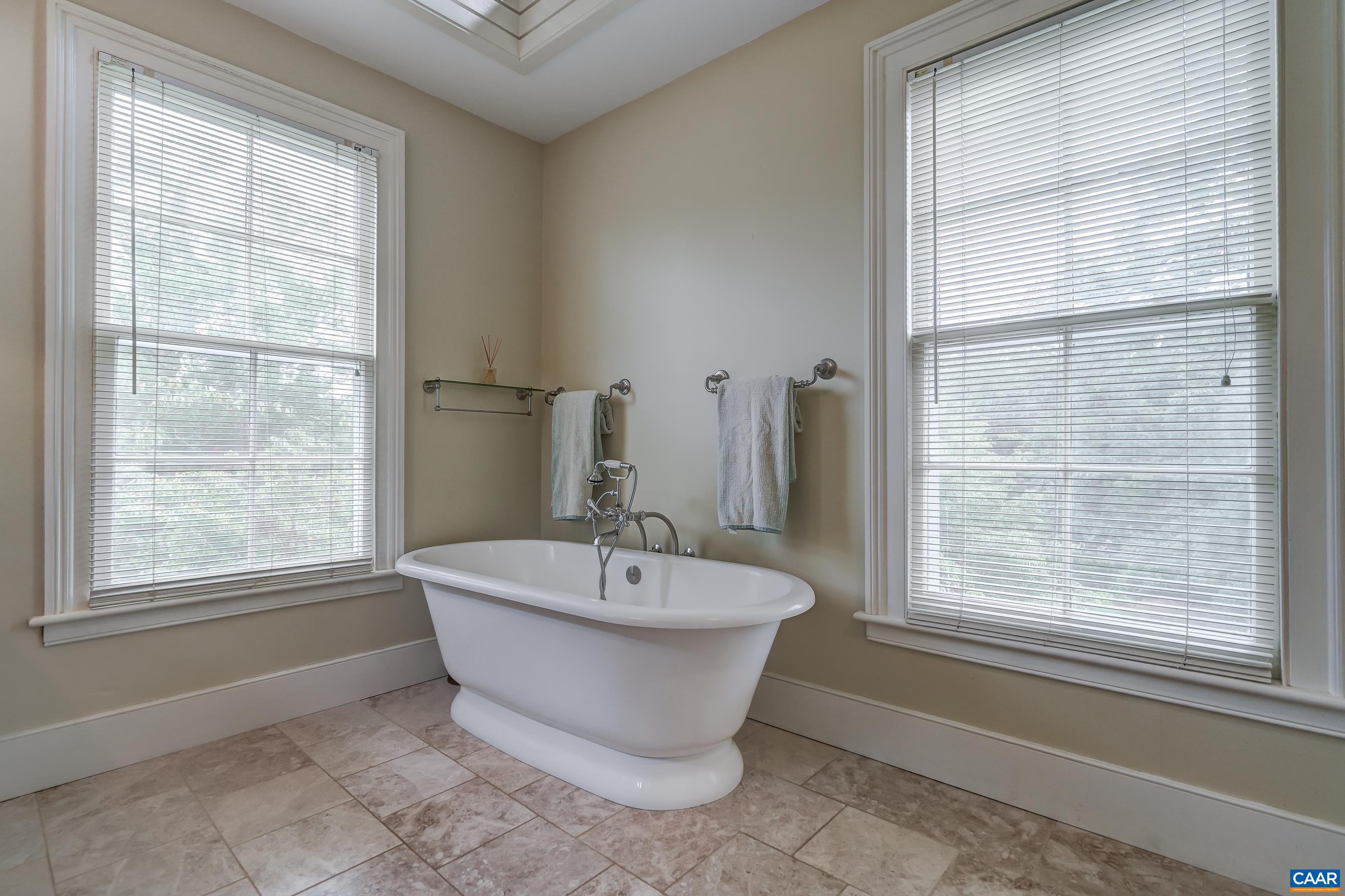 Owner's private bath with soaking tub.