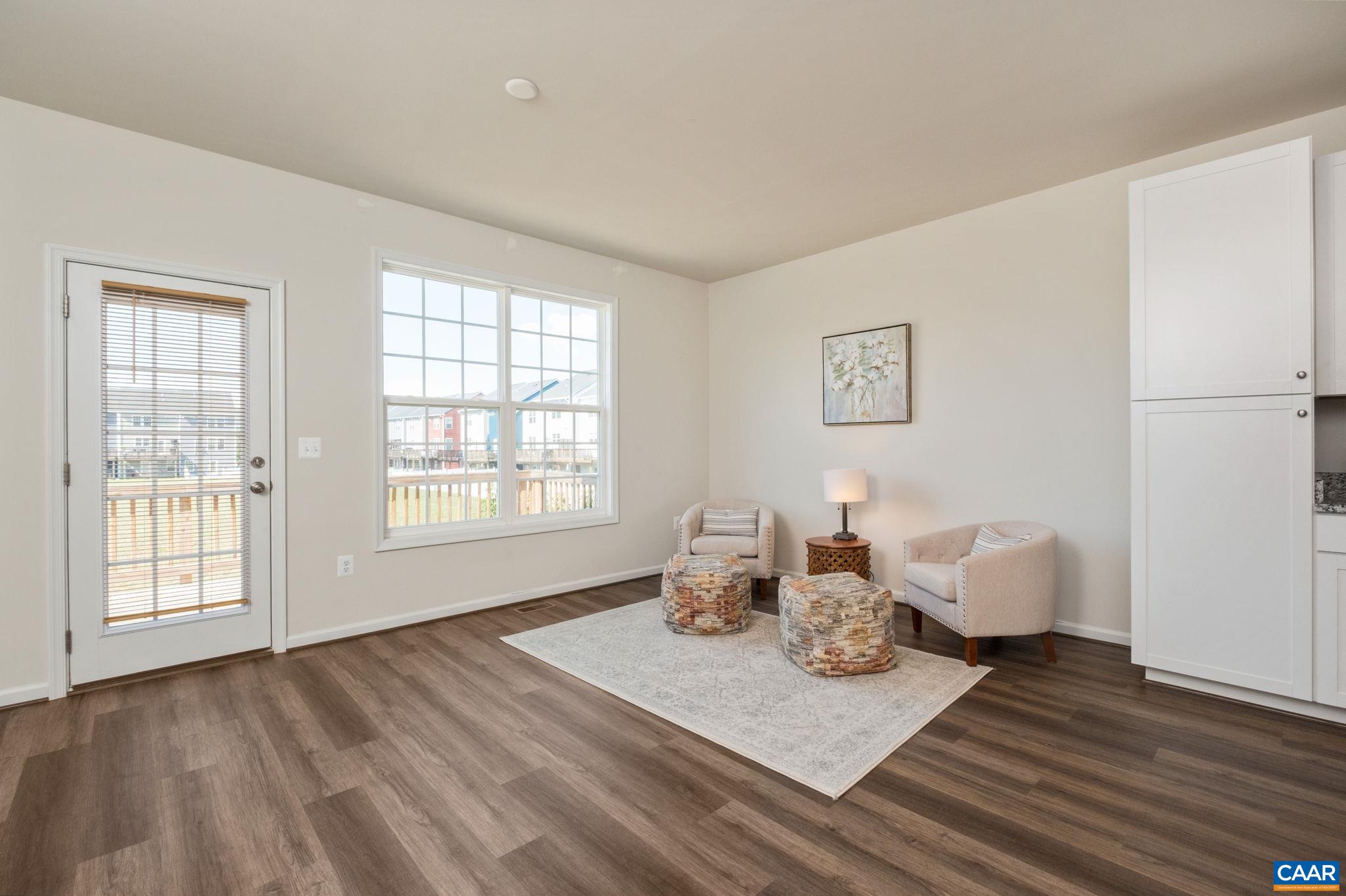 Living room with Back Deck Access