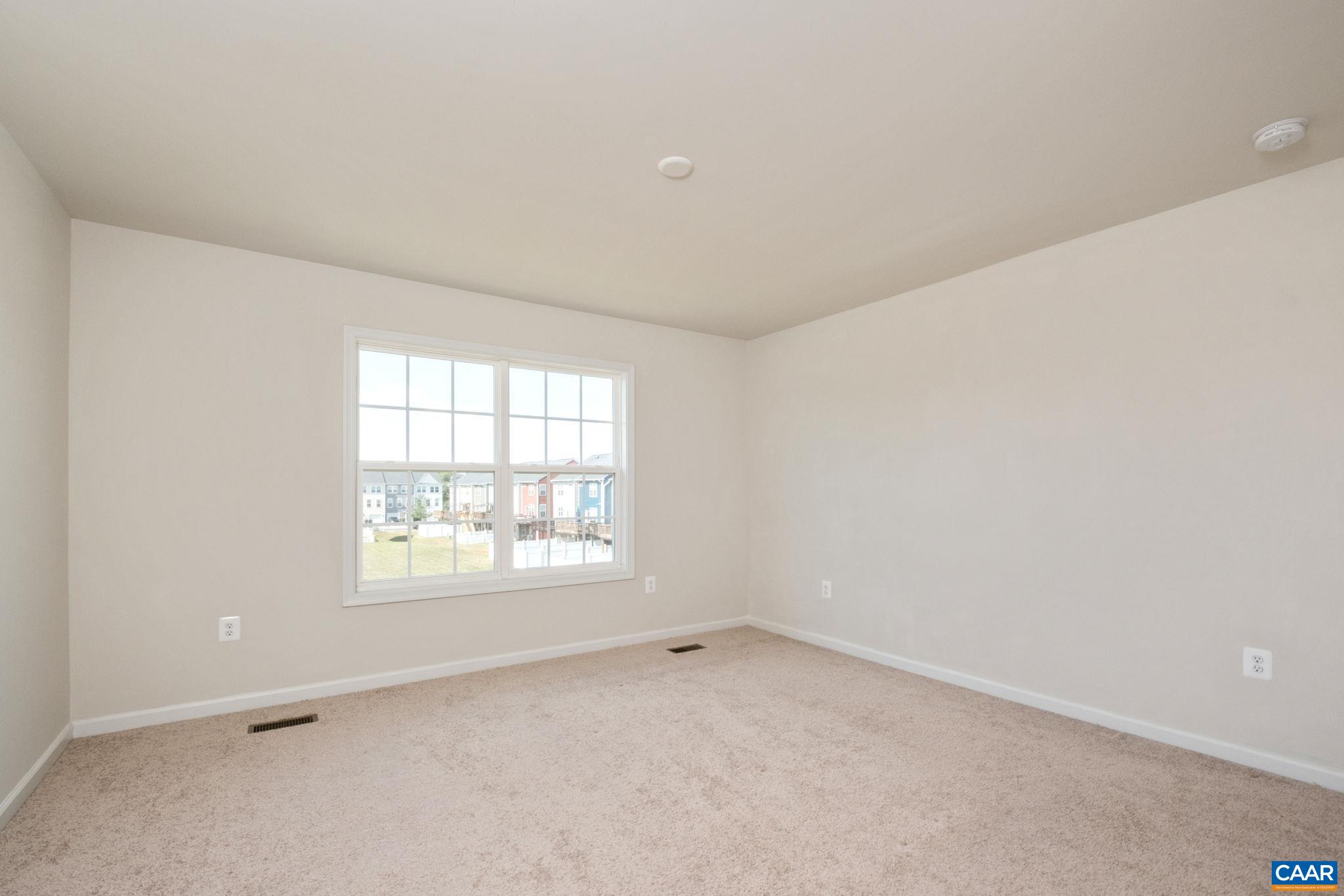 Primary Suite over looking Green Space