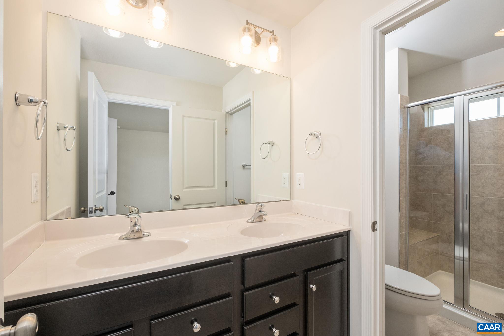 Double Vanity Primary Suite Bathroom