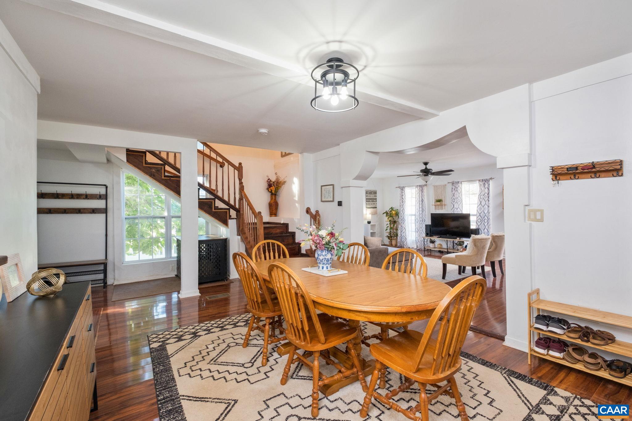 Large dining room as you enter features modern lighting and neutral paints. Large dining room as you enter features modern lighting and neutral paints.
