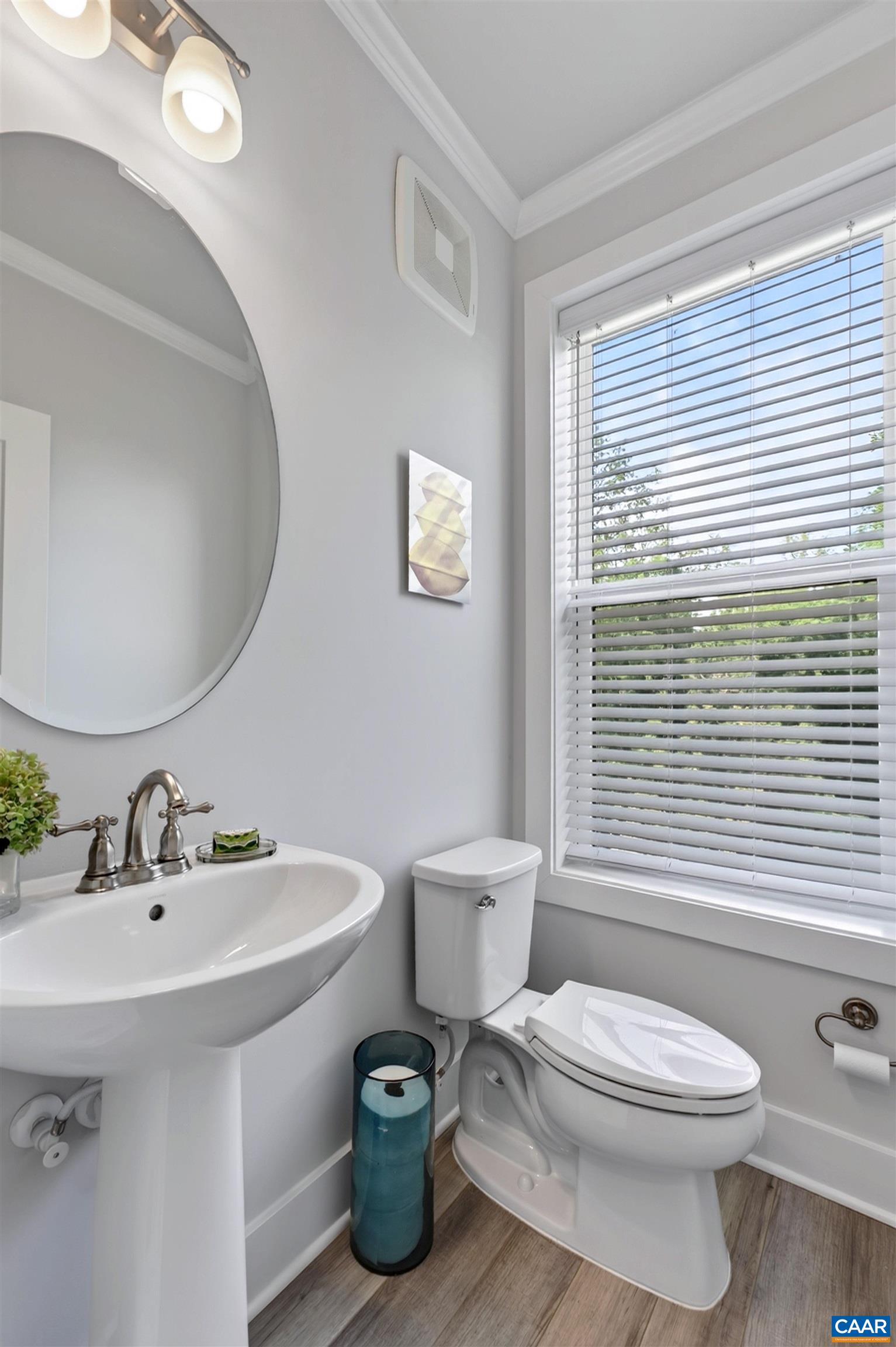 Crown moulding runs throughout this well appointed home