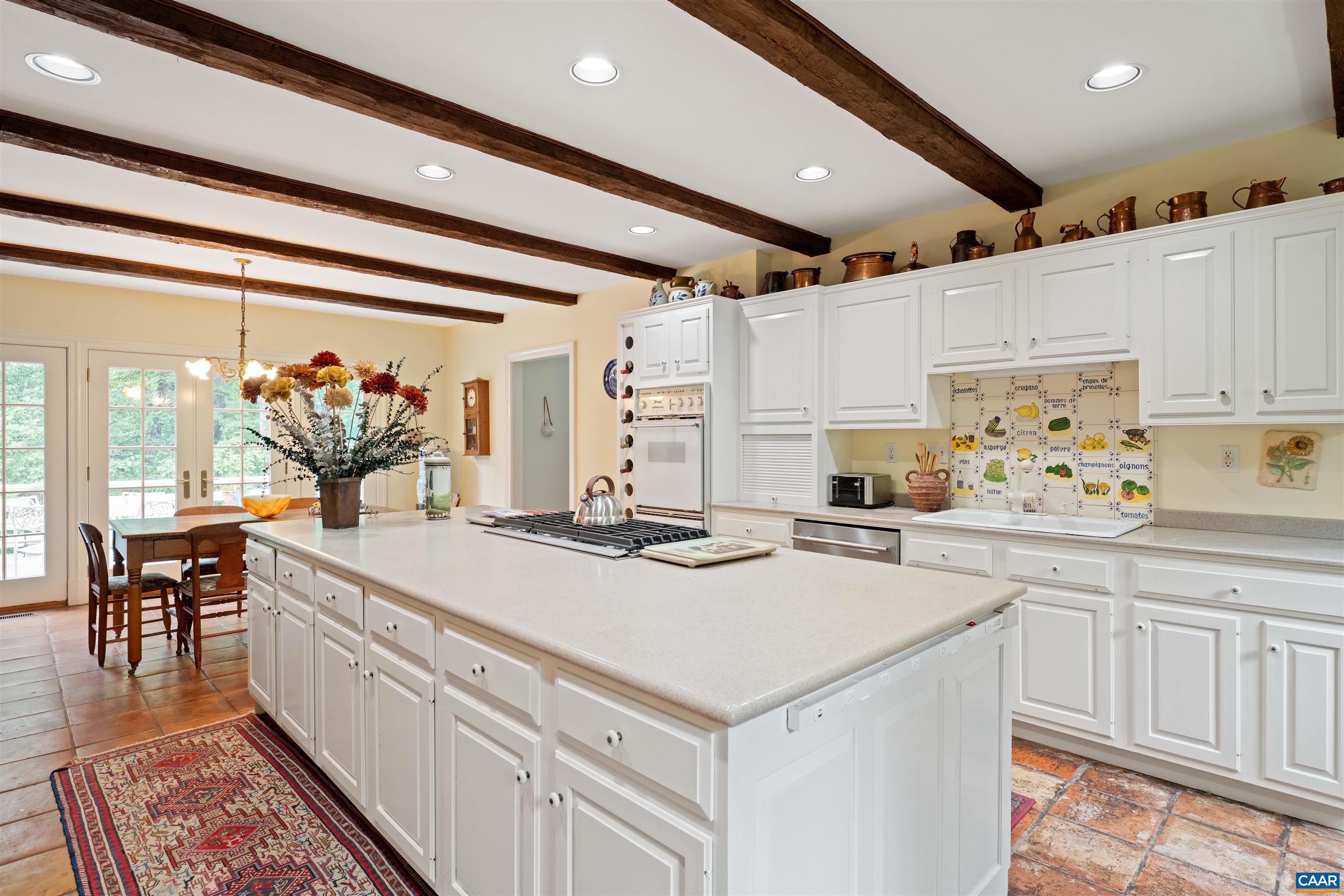Well designed with center island and lots of cabinet storage. Ideal for cooking and entertaining!