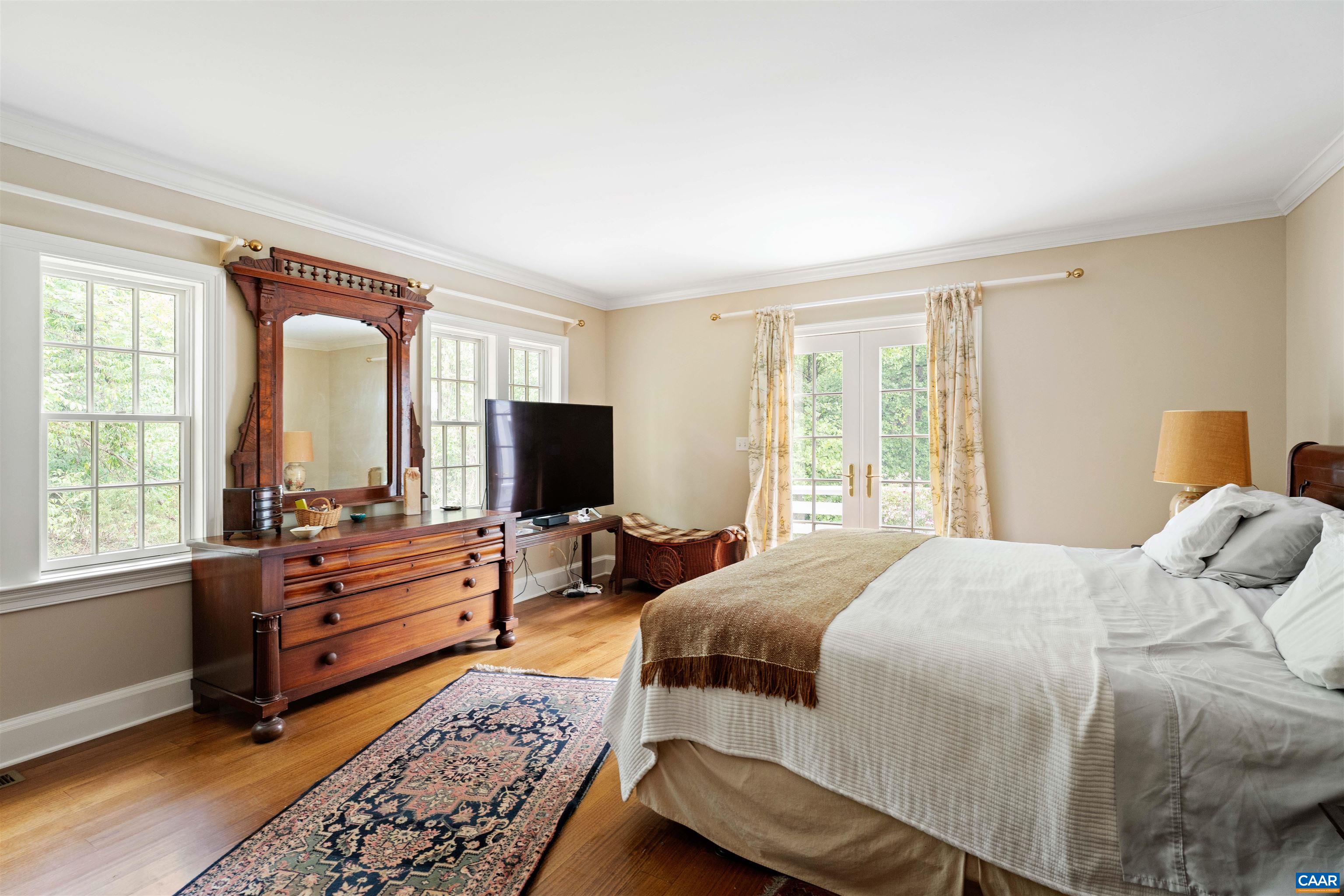Located on the main level with private deck access.