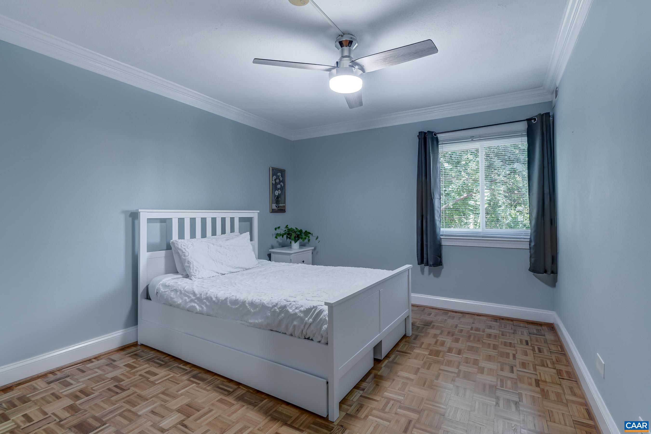Two bedrooms - each feature a ceiling fan. Two bedrooms - each feature a ceiling fan.