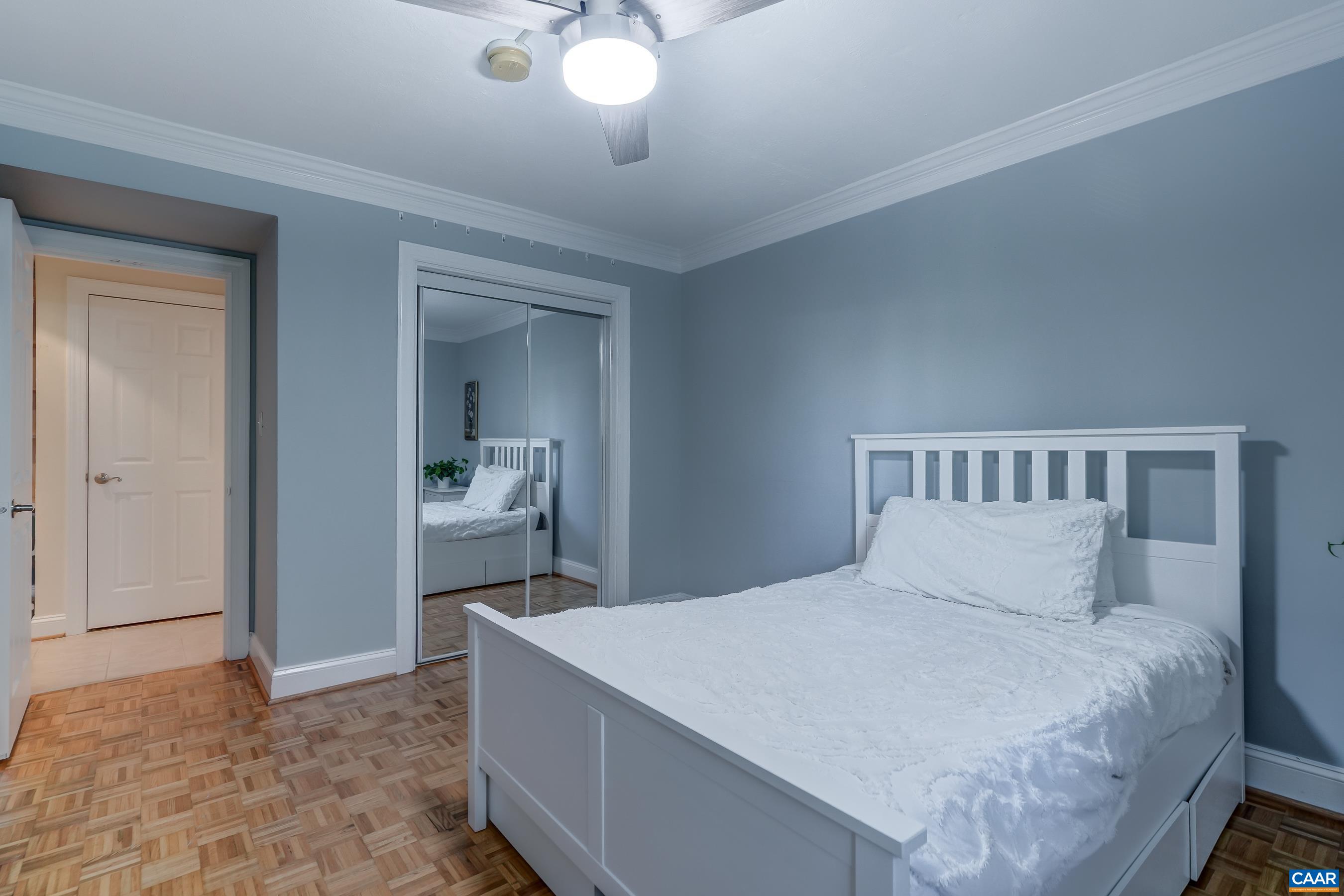 Two bedrooms - each feature a ceiling fan. Two bedrooms - each feature a ceiling fan.