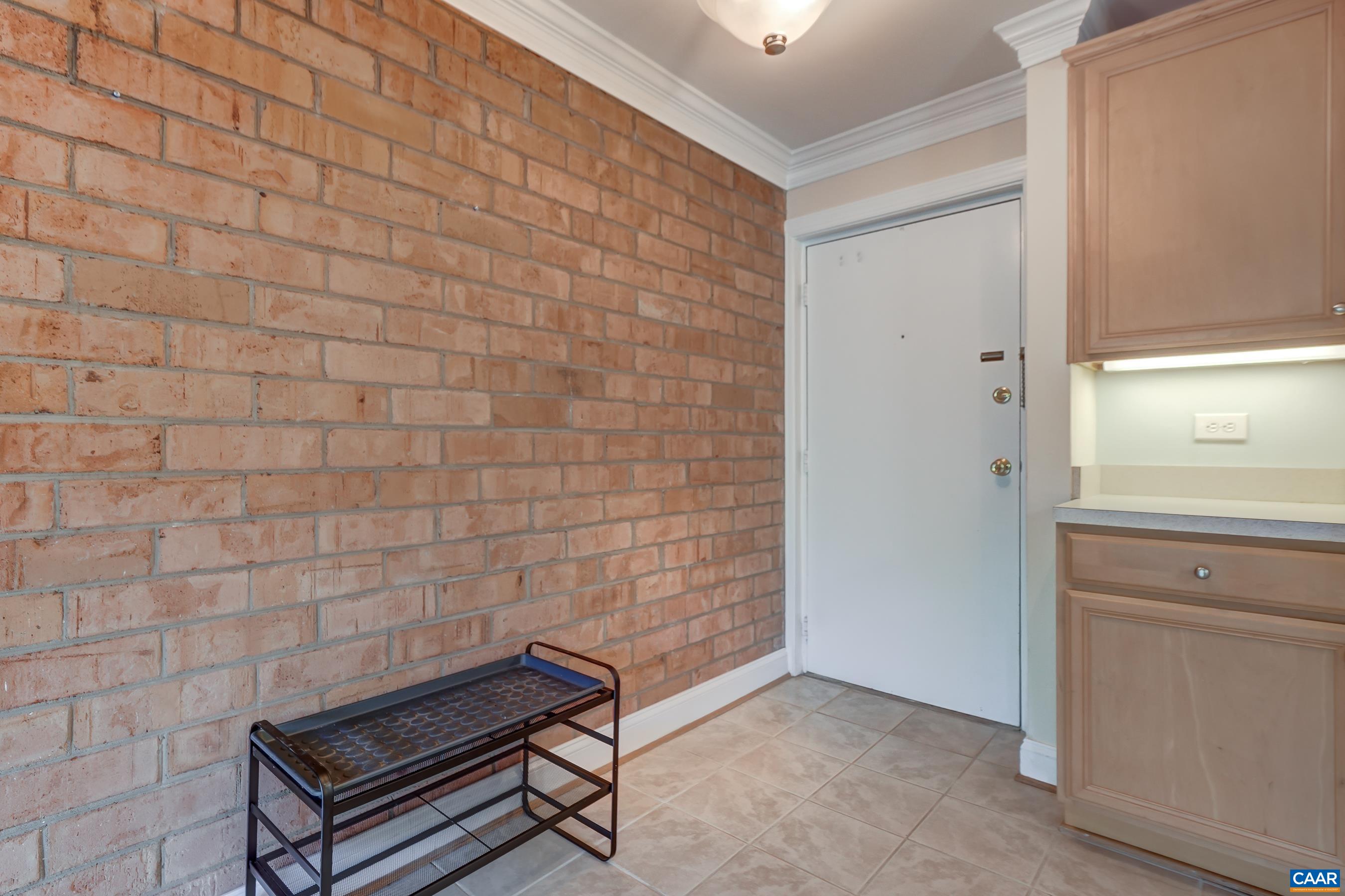 Exposed brick walls and parquet floors add charm. Exposed brick walls and parquet floors add charm.