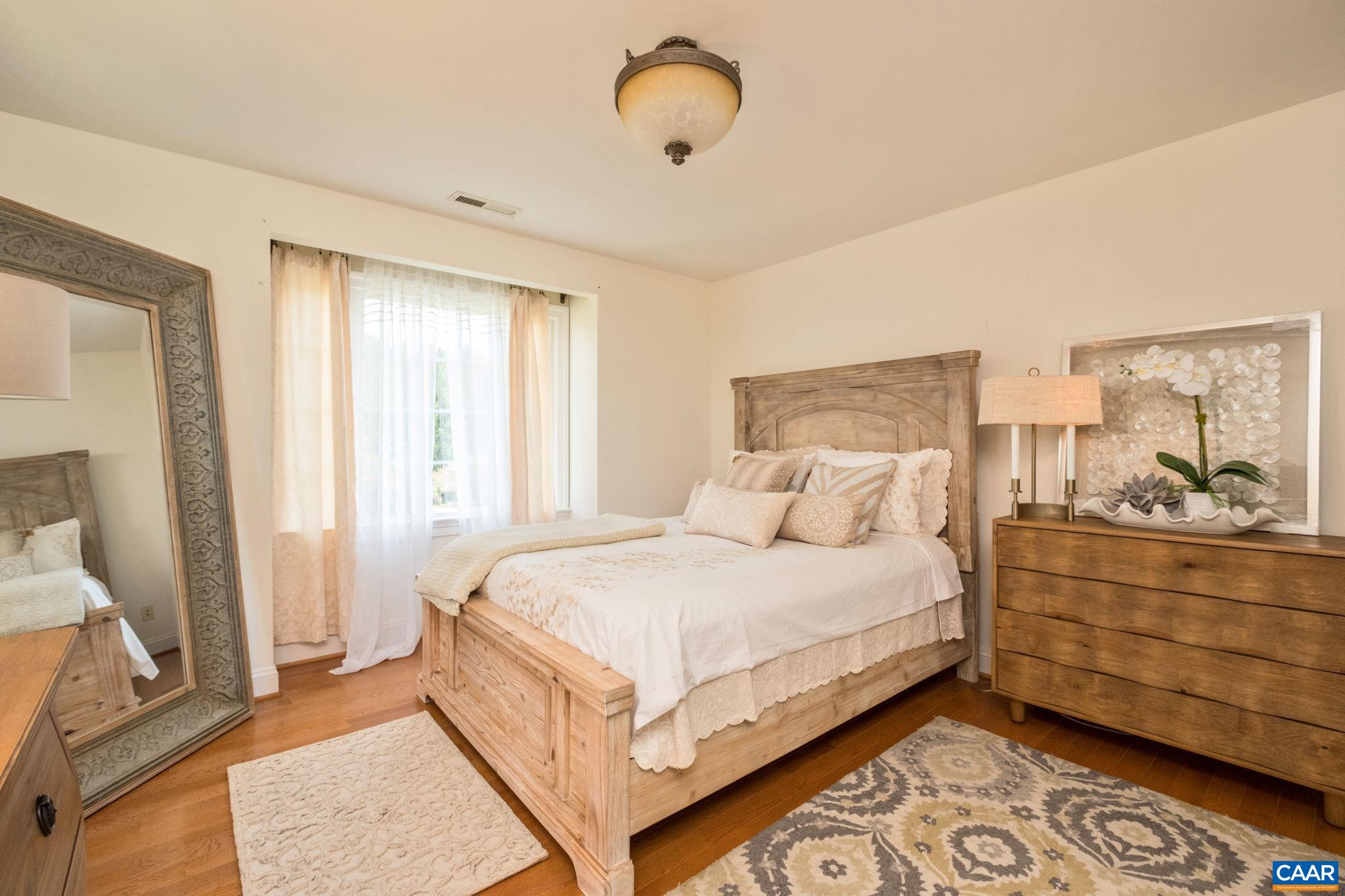 This bedroom is located at the top of the stairs. This bedroom is located at the top of the stairs.