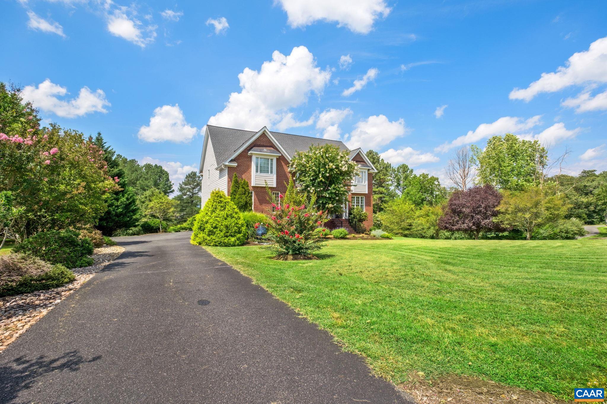 A three-car garage is on the side of the home. A three-car garage is on the side of the home.