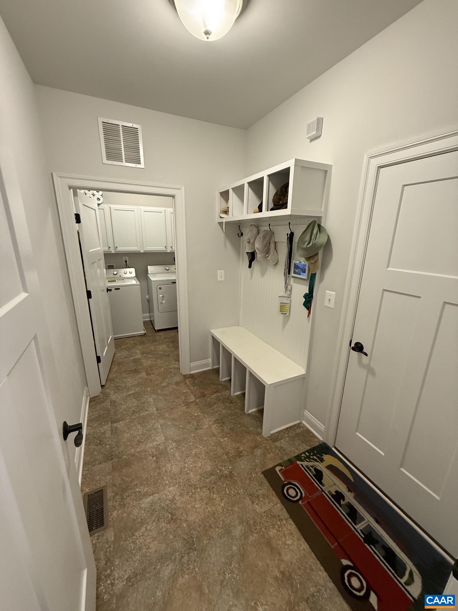 Built-in bench with cubbies ans coat hooks. Built-in bench with cubbies ans coat hooks.