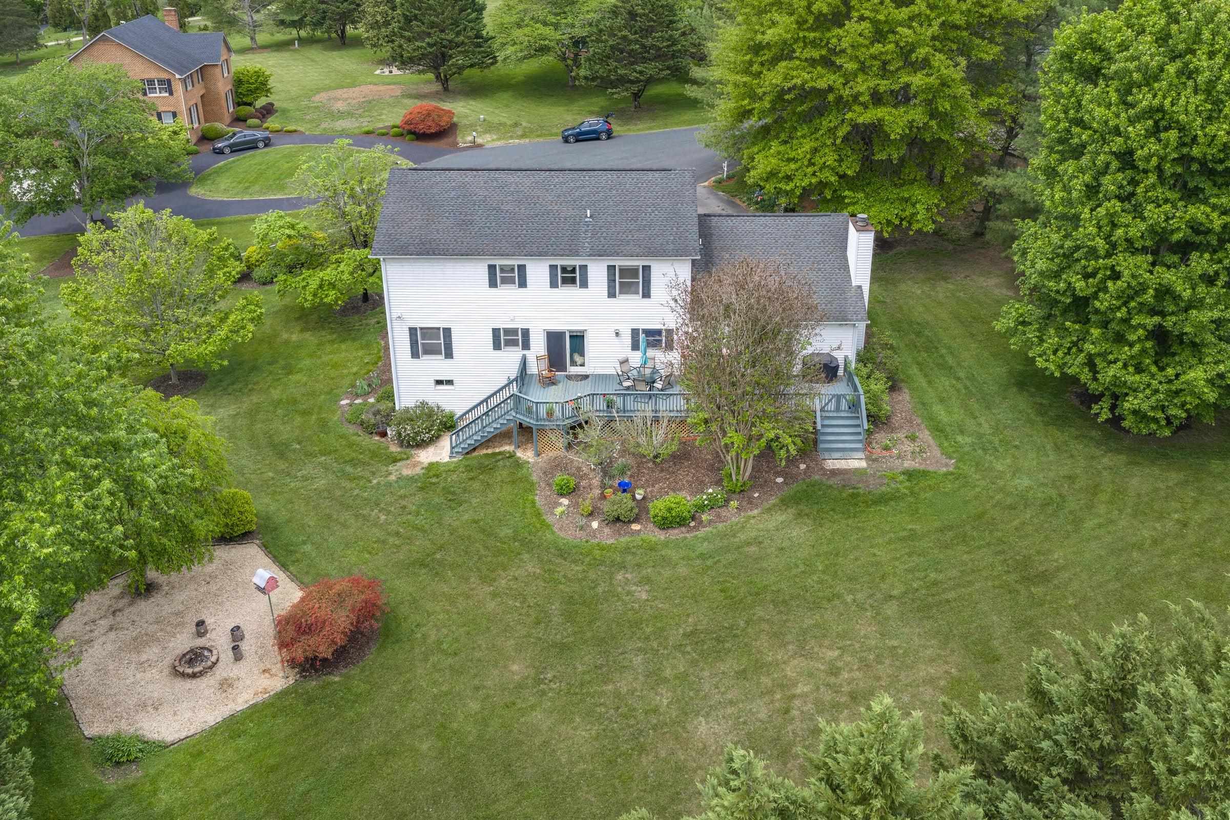 A gardener’s dream, surrounded by mature trees, flowers, and natural beauty. A gardener’s dream, surrounded by mature trees, flowers, and natural beauty.
