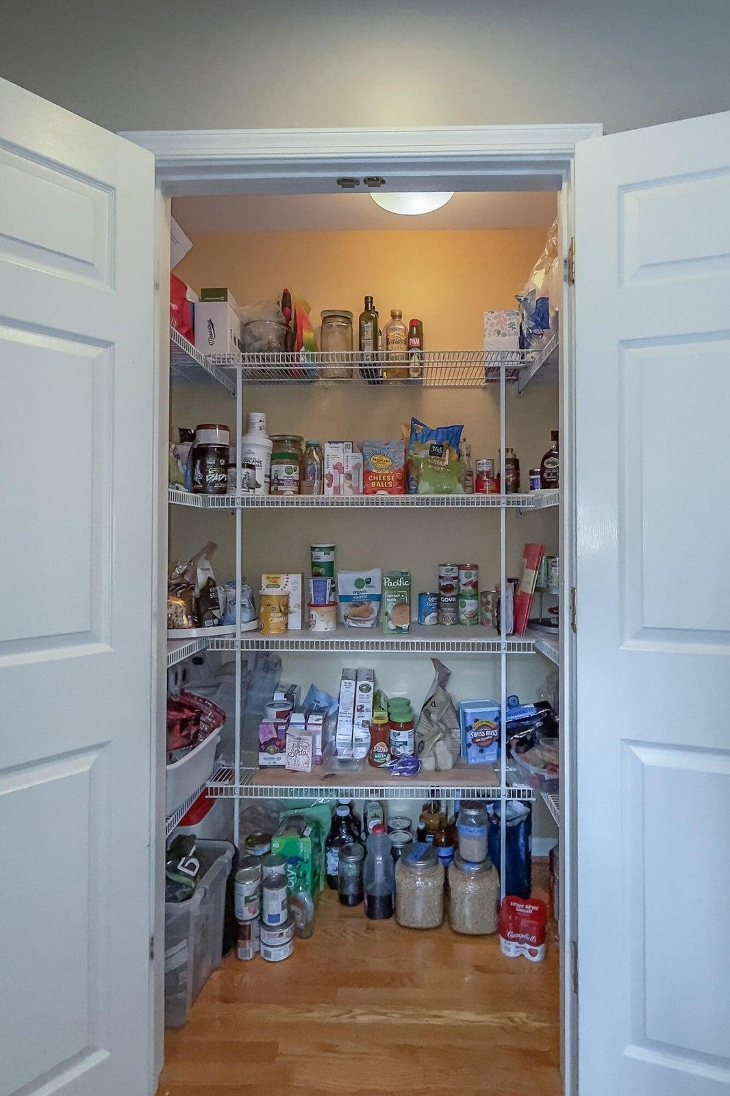Spacious walk-in pantry . . . Spacious walk-in pantry . . .