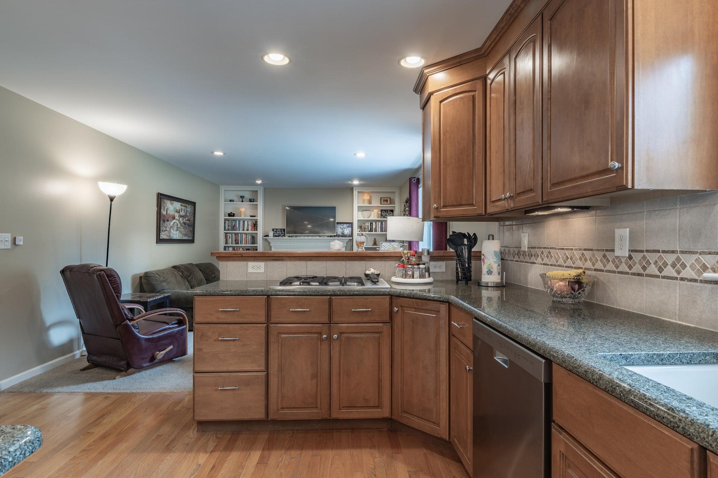 Kitchen opens to a comfortable family room. Kitchen opens to a comfortable family room.