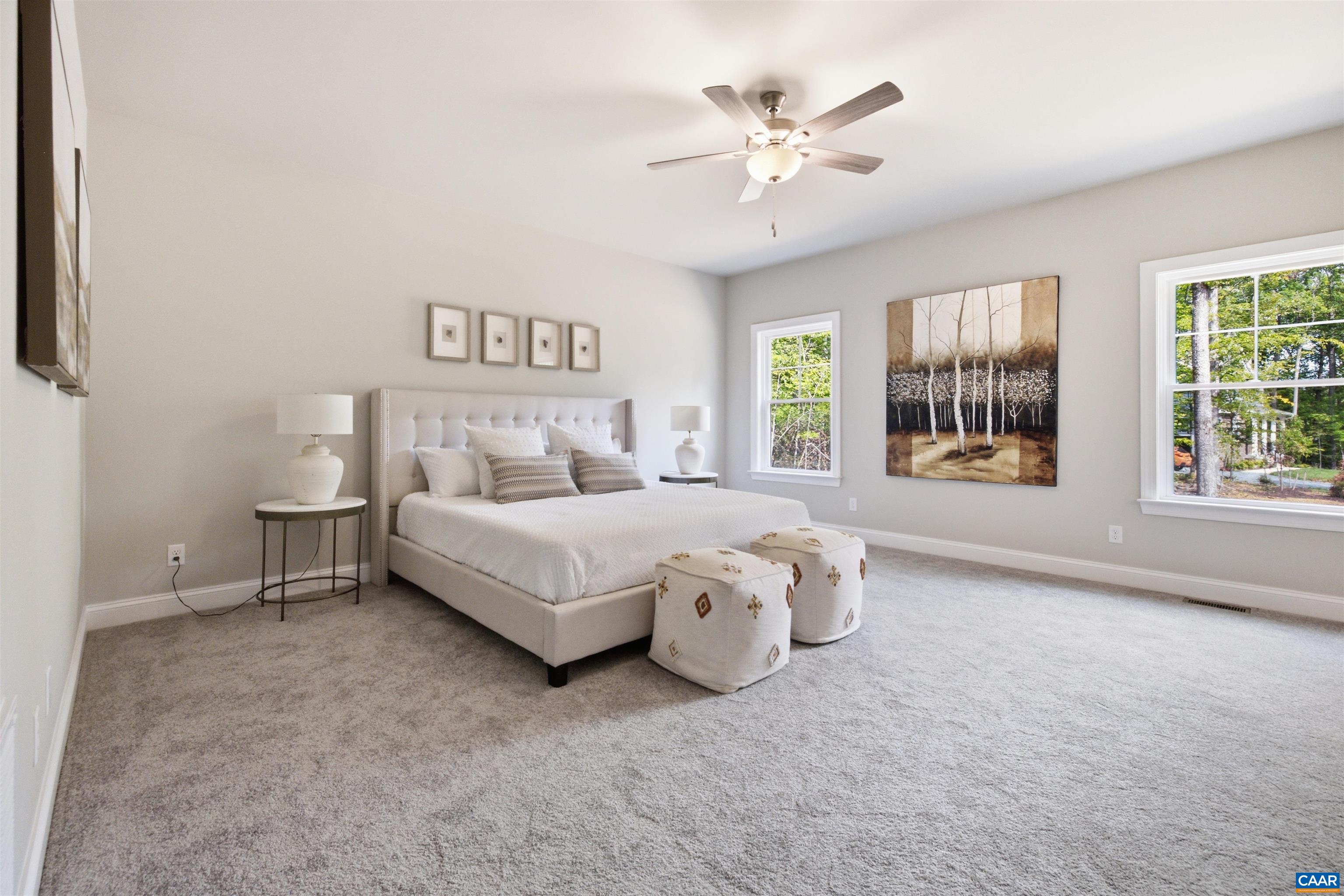 Walk-in closet in the bedroom. Primary bedroom located on the opposite side of the home from the secondary bedroom. Near Laundry/garage entrance. Photo of a staged home. Walk-in closet in the bedroom. Primary bedroom located on the opposite side of the home from the secondary bedroom. Near Laundry/garage entrance. Photo of a staged home.