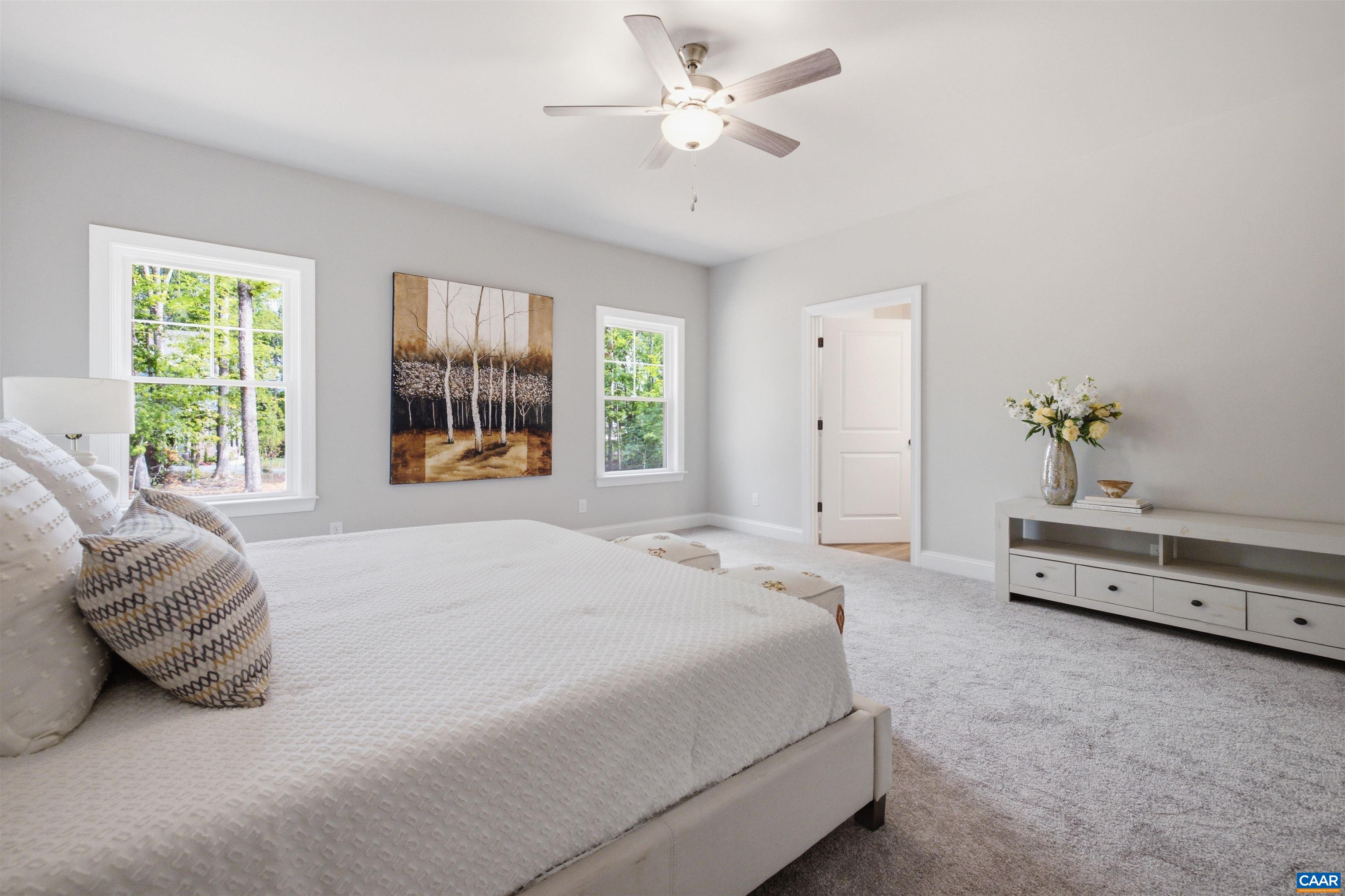 Light/bright room with ensuite. Photo of a staged home. Light/bright room with ensuite. Photo of a staged home.