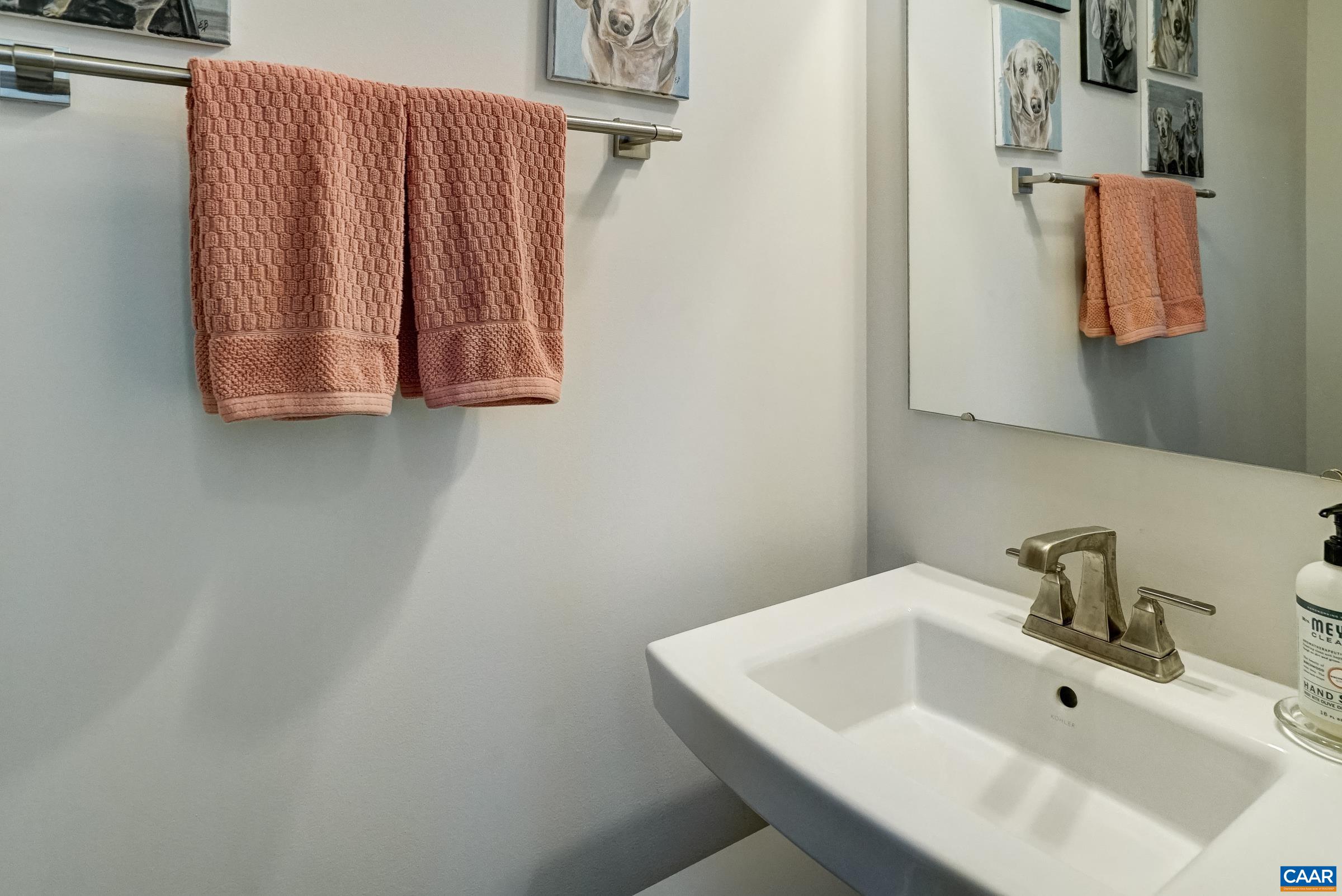 half bath is tucked away from kitchen & dining area half bath is tucked away from kitchen & dining area
