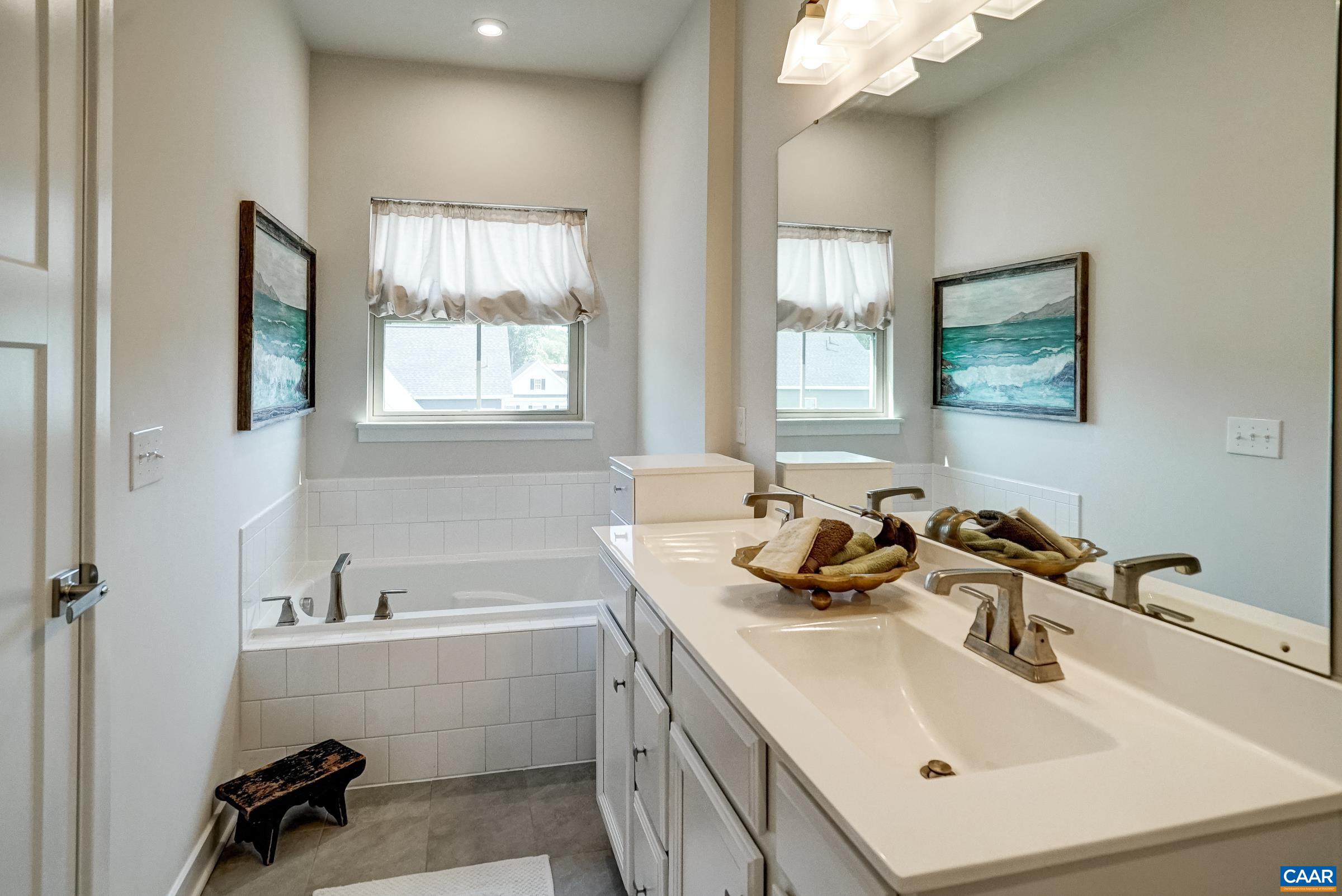 dual vanities and a soaking tub dual vanities and a soaking tub