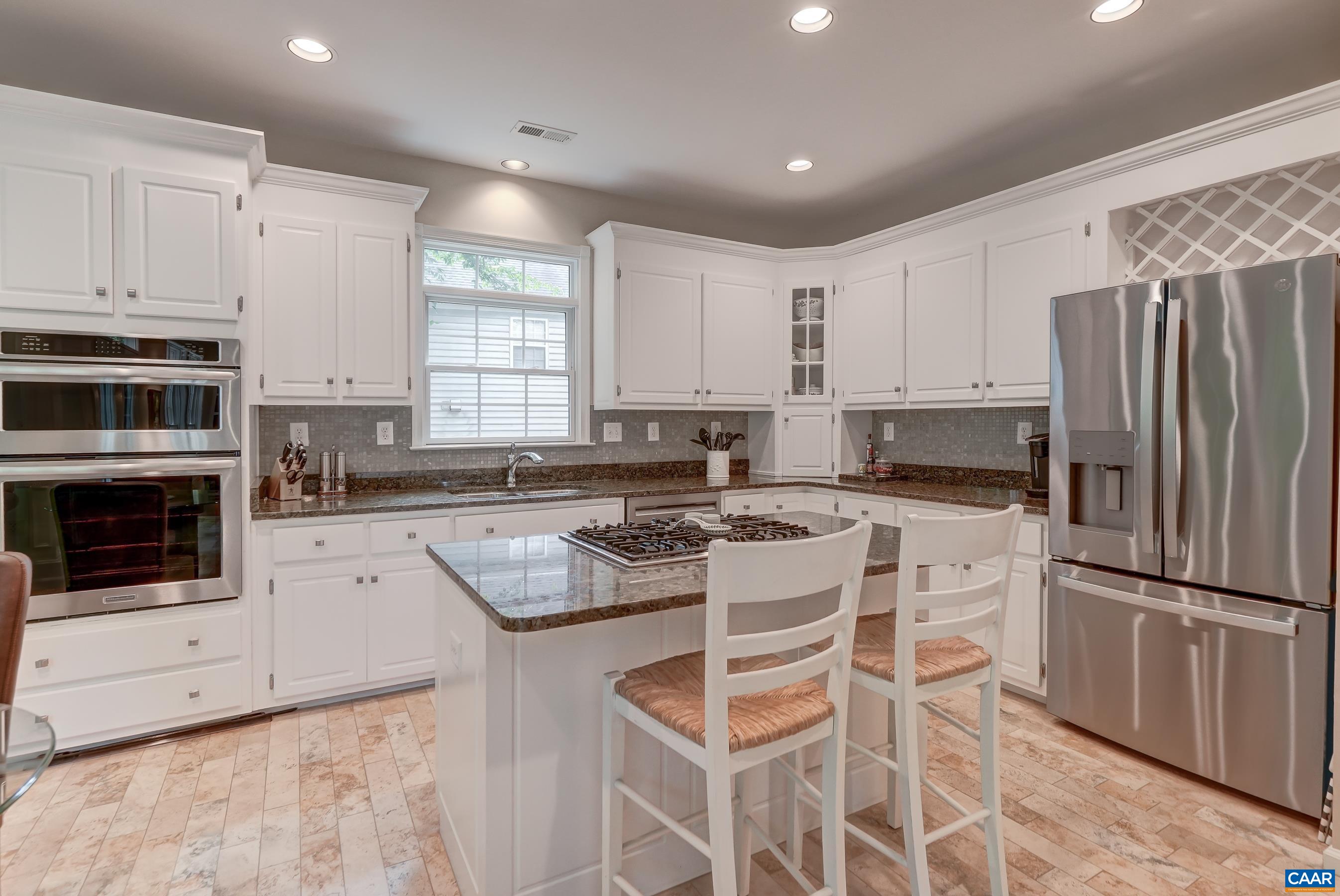 Beautifully updated kitchen features stainless appliances including a new wall oven (2026) Beautifully updated kitchen features stainless appliances including a new wall oven (2026)