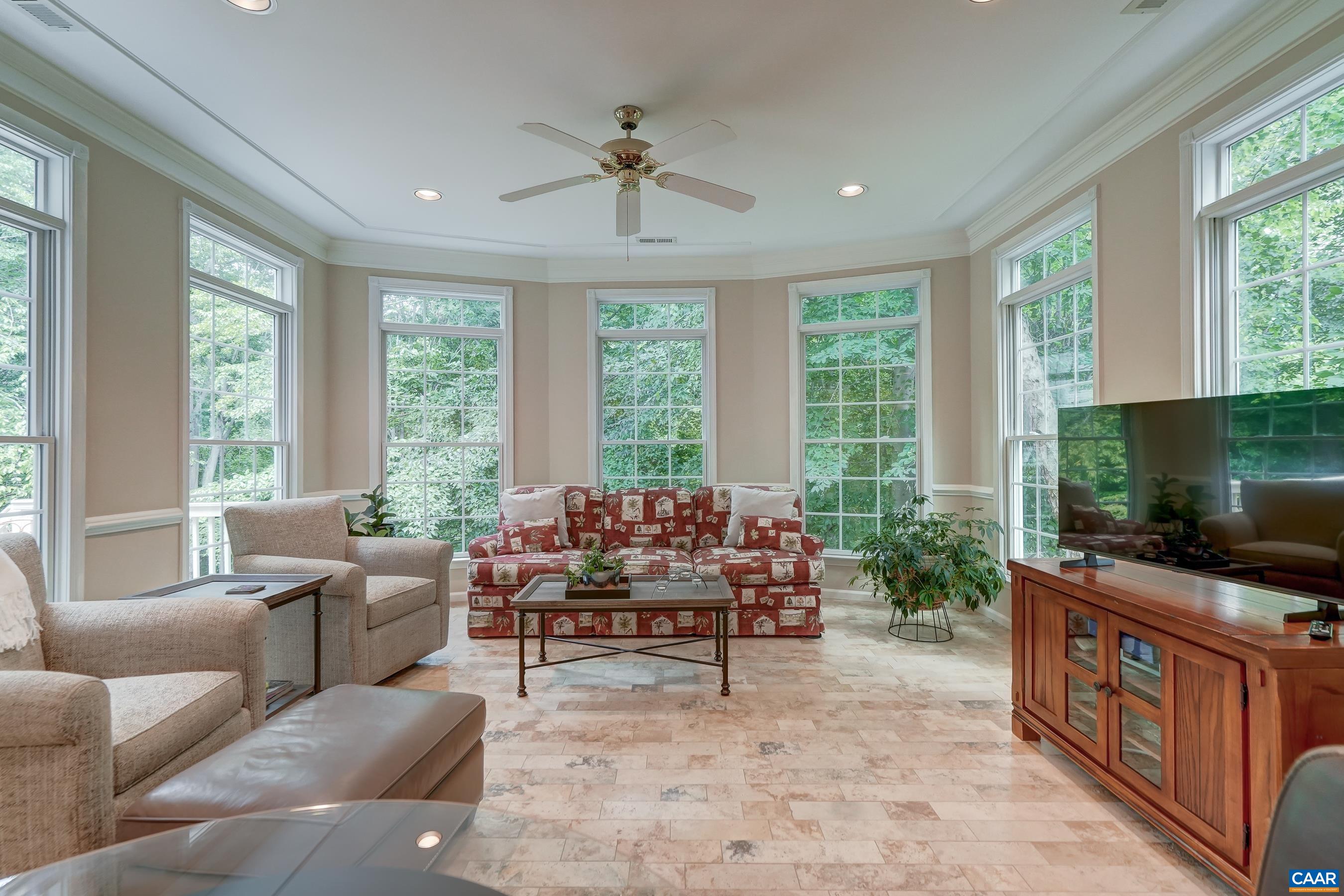 Cozy sun room with 270 degrees of windows - feels like you are in a tree house! Cozy sun room with 270 degrees of windows - feels like you are in a tree house!