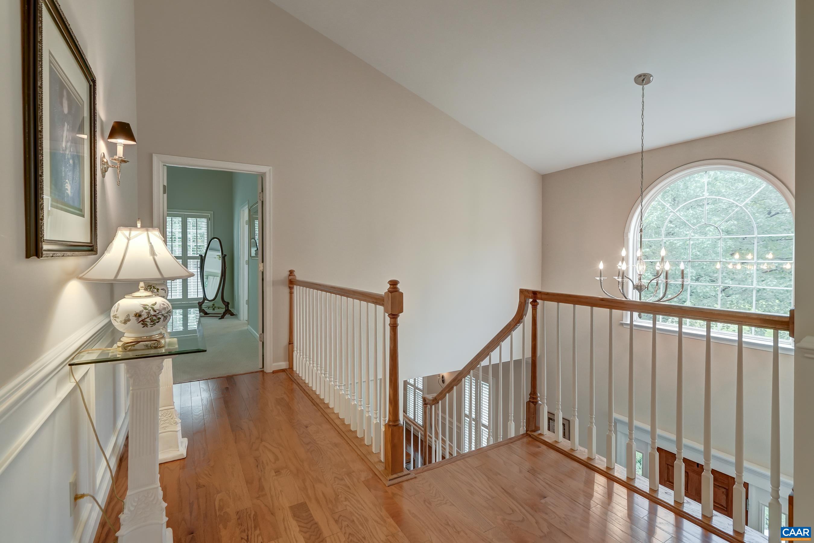 Hardwood floors in the hallway of the second floor. Hardwood floors in the hallway of the second floor.