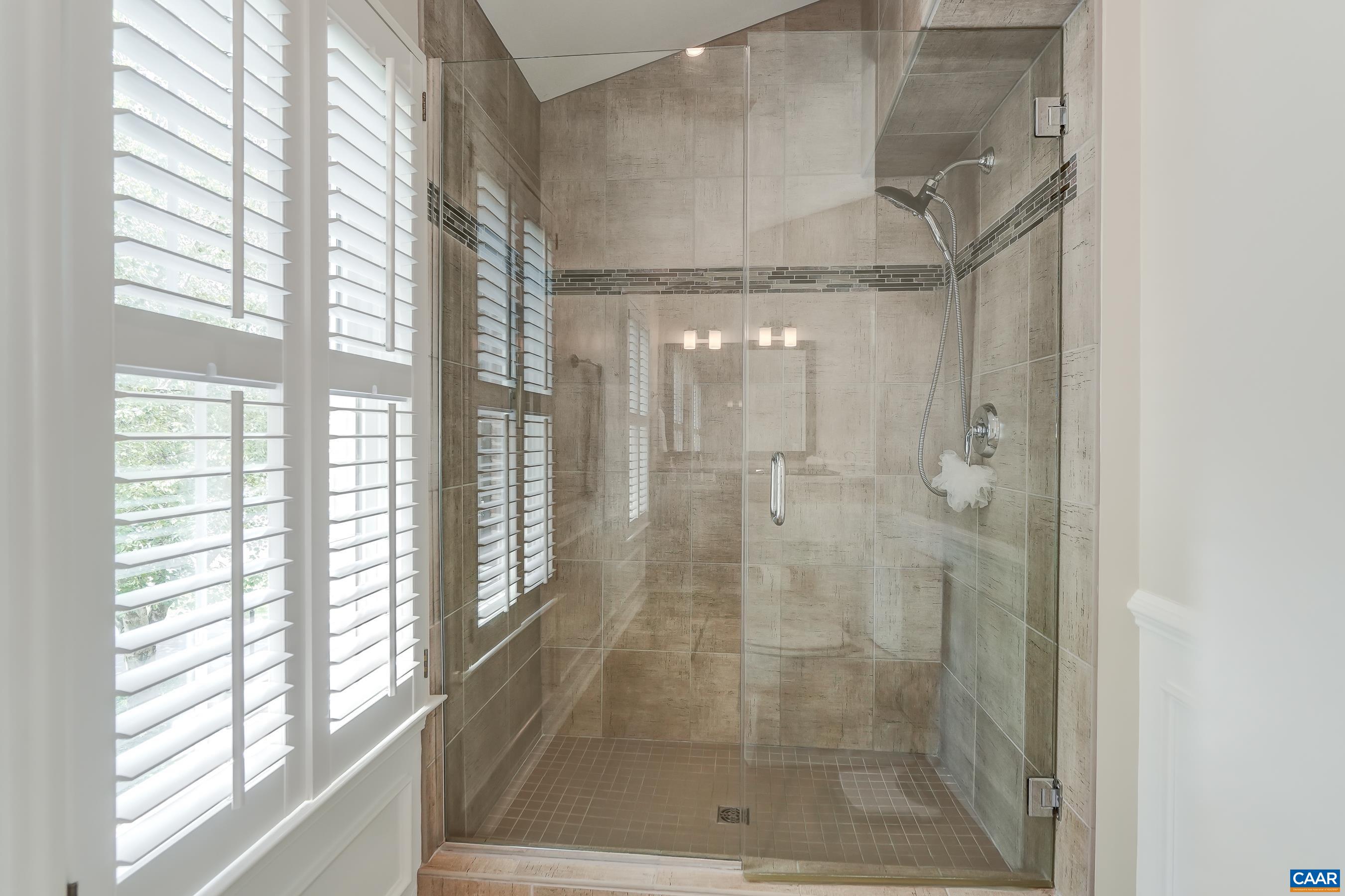 Separate tiled shower. Separate tiled shower.