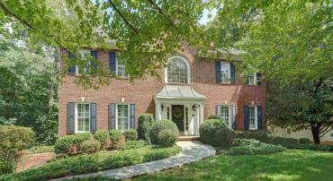 Stunning brick front home in the popular Dunloar community is a show-stopper!