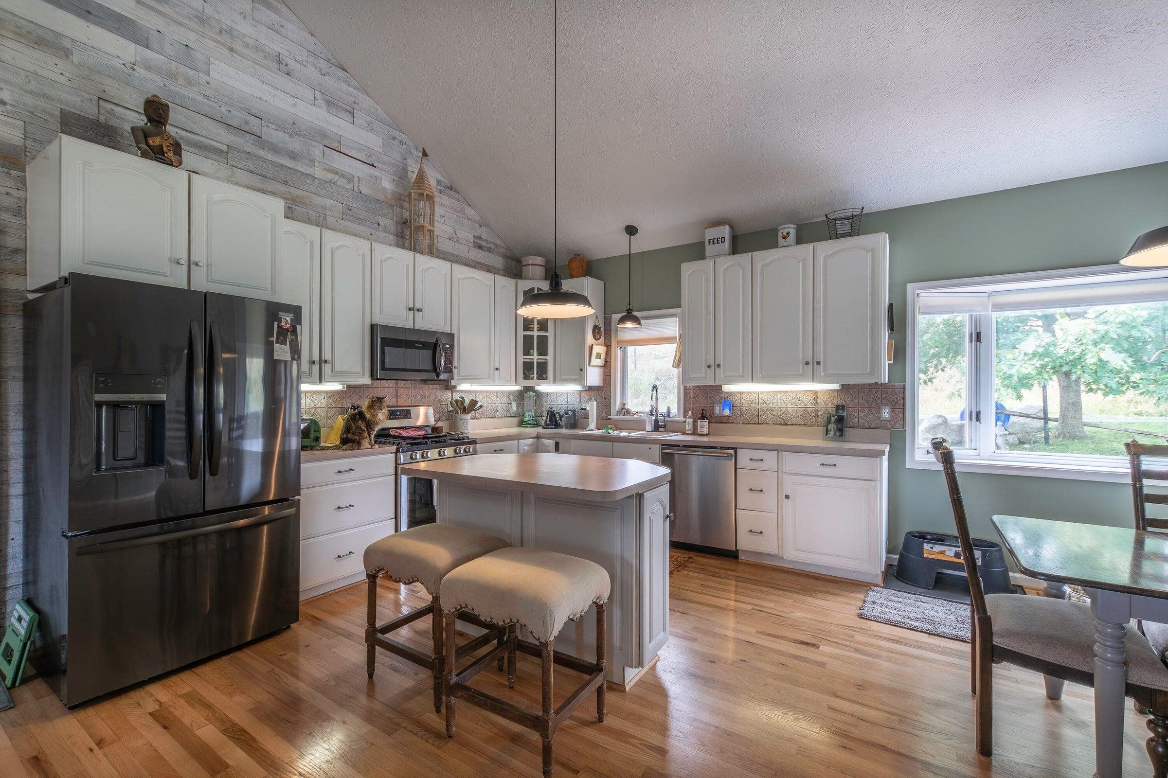 Inside you'll find an open floor plan with vaulted ceilings. Inside you'll find an open floor plan with vaulted ceilings.