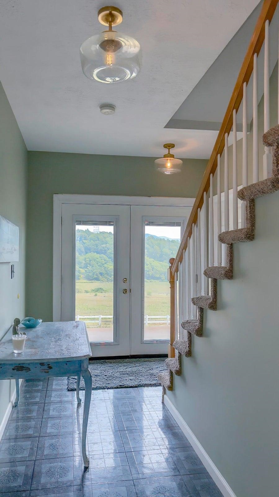 Lower level is set up to be a mother-in law suite with its own private entrance through French doors. Lower level is set up to be a mother-in law suite with its own private entrance through French doors.