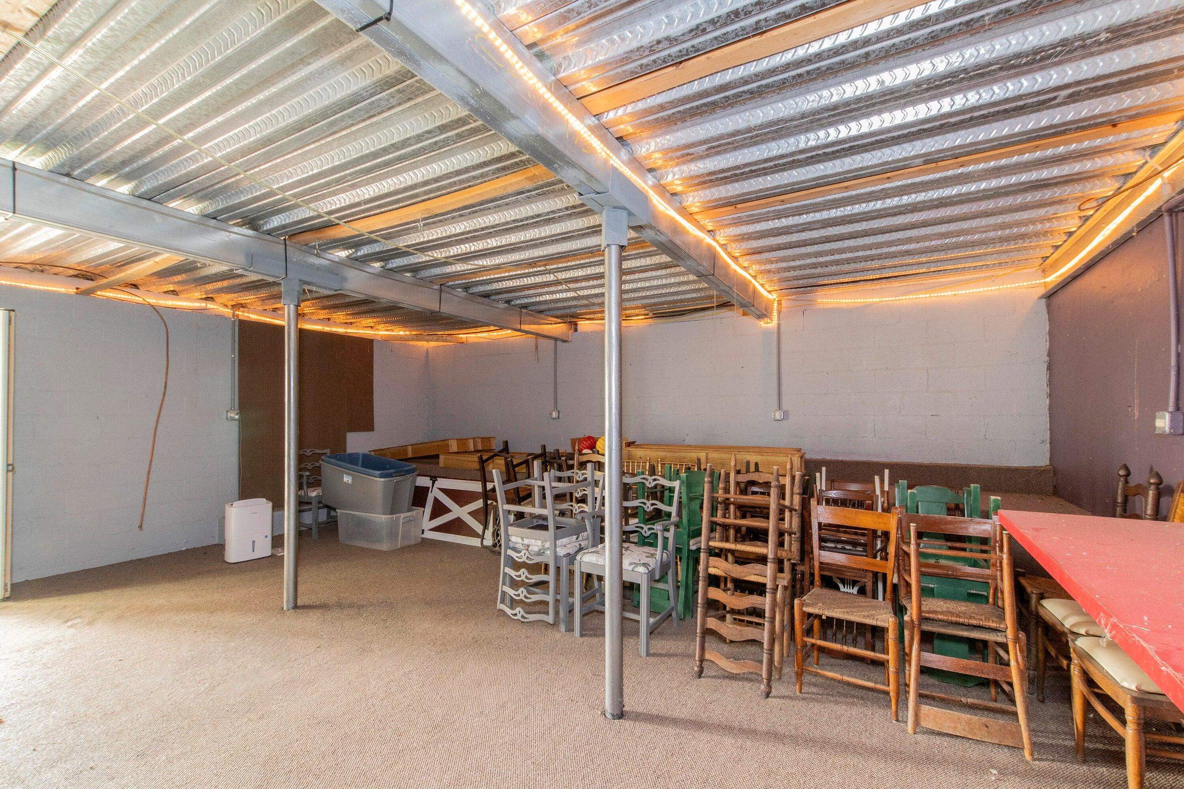 Storage area under the Garage. Accessed from outside. Storage area under the Garage. Accessed from outside.