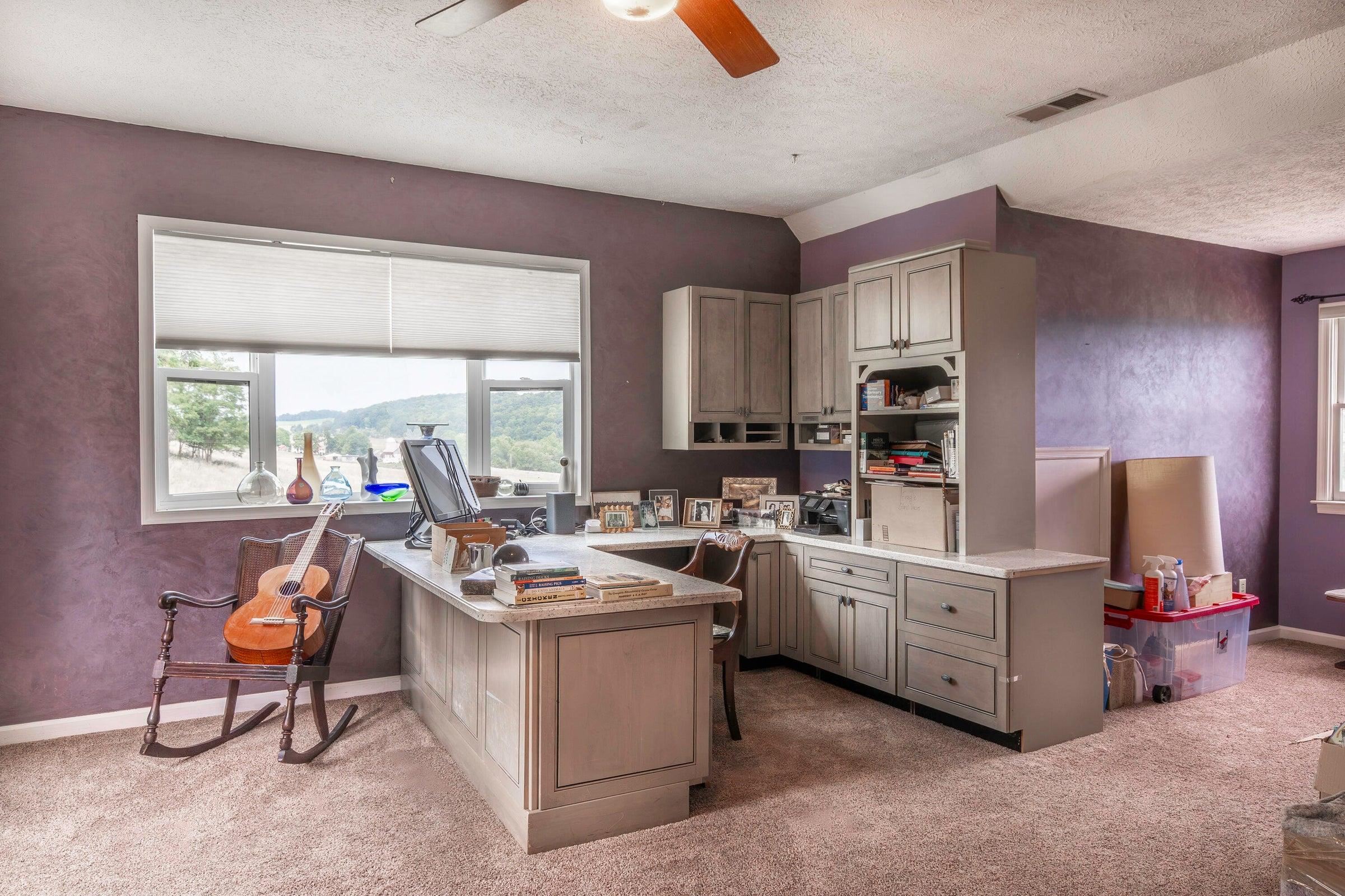 An upstairs loft for flex space or office. An upstairs loft for flex space or office.