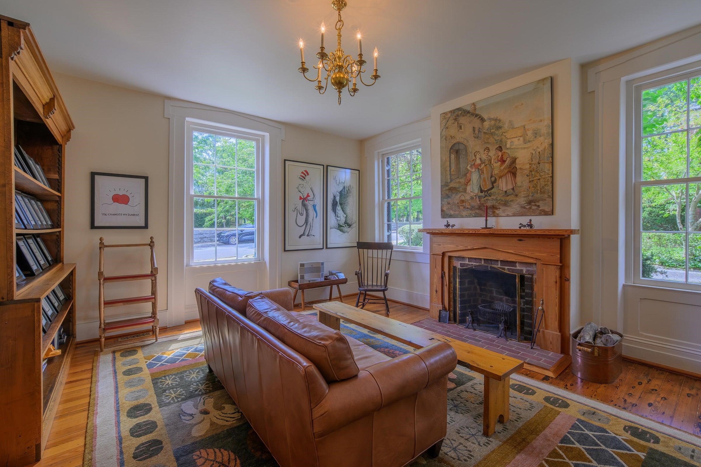 Expansive, light-filled rooms are framed by 6 ½-foot windows and soaring 10-foot ceilings, creating a bright and welcoming atmosphere throughout. Expansive, light-filled rooms are framed by 6 ½-foot windows and soaring 10-foot ceilings, creating a bright and welcoming atmosphere throughout.