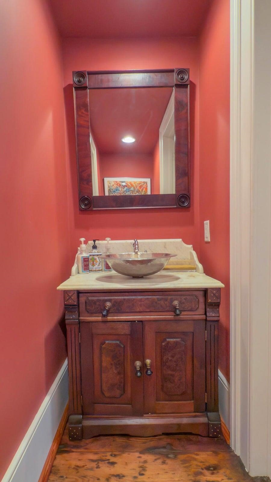 Stylish main-level powder room. Stylish main-level powder room.